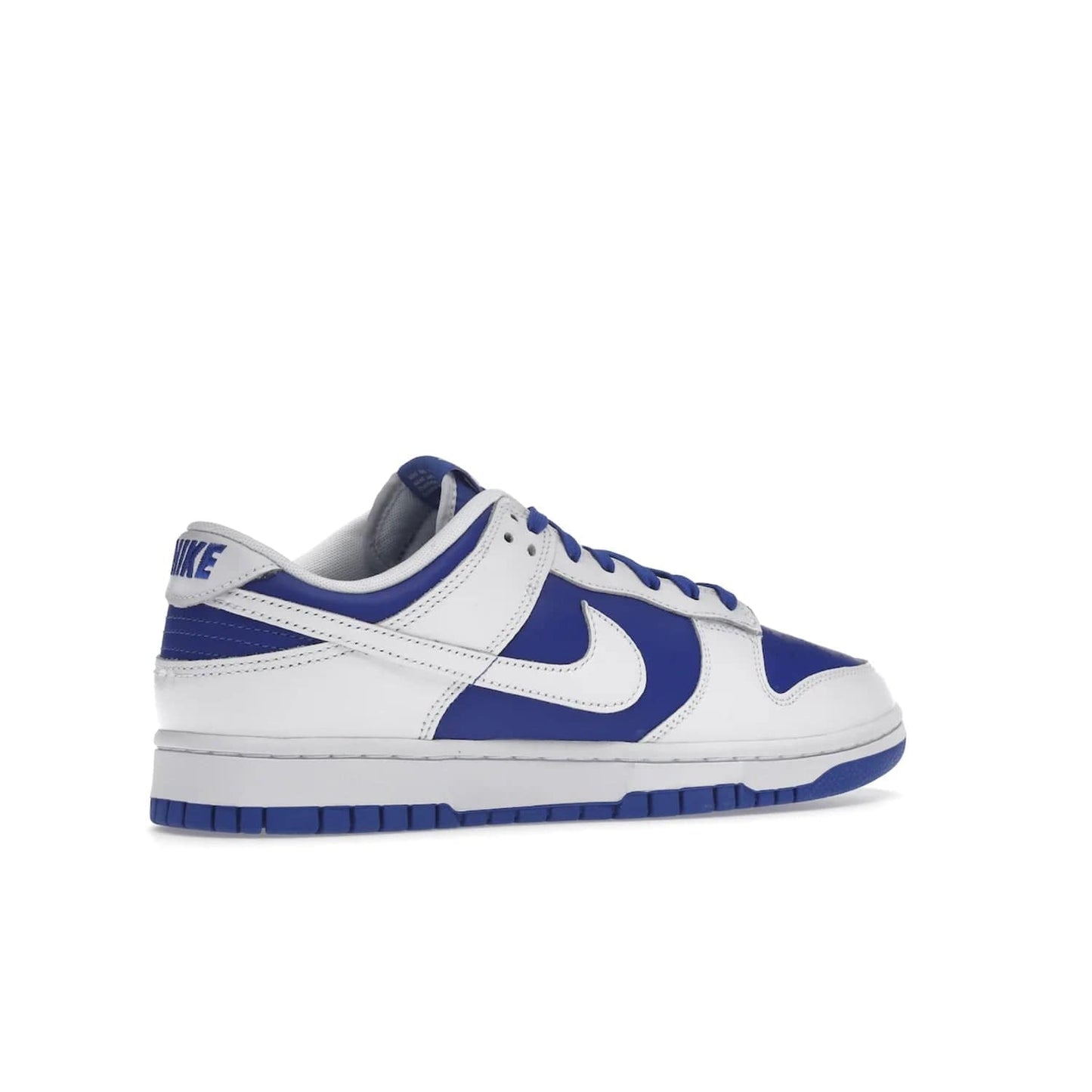 Nike Dunk Low Racer Blue White - Image 34 - Only at www.BallersClubKickz.com - Sleek Racer Blue leather upper and white leather overlays make up the Nike Dunk Low Racer Blue White. Woven tag and heel embroidery for a 1985 Dunk look with a matching EVA foam sole completes the classic colorway.