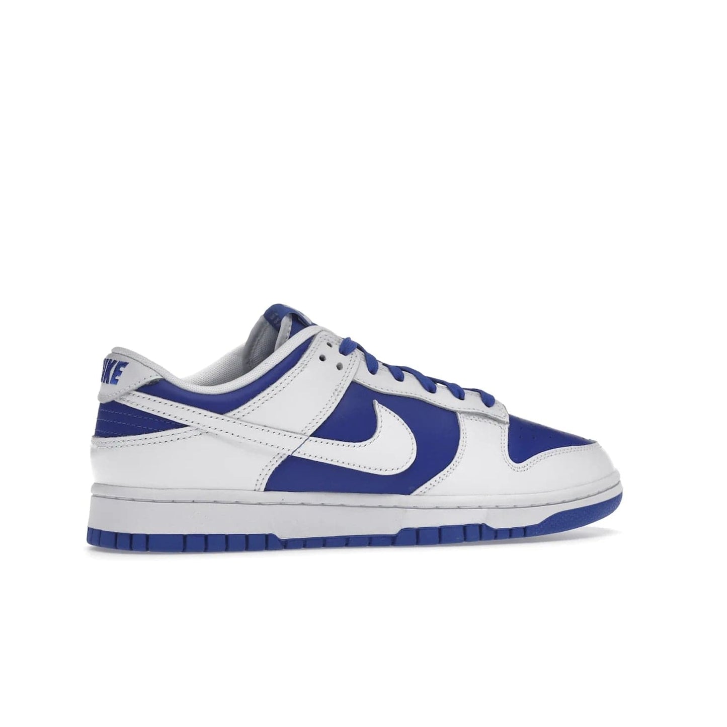 Nike Dunk Low Racer Blue White - Image 35 - Only at www.BallersClubKickz.com - Sleek Racer Blue leather upper and white leather overlays make up the Nike Dunk Low Racer Blue White. Woven tag and heel embroidery for a 1985 Dunk look with a matching EVA foam sole completes the classic colorway.