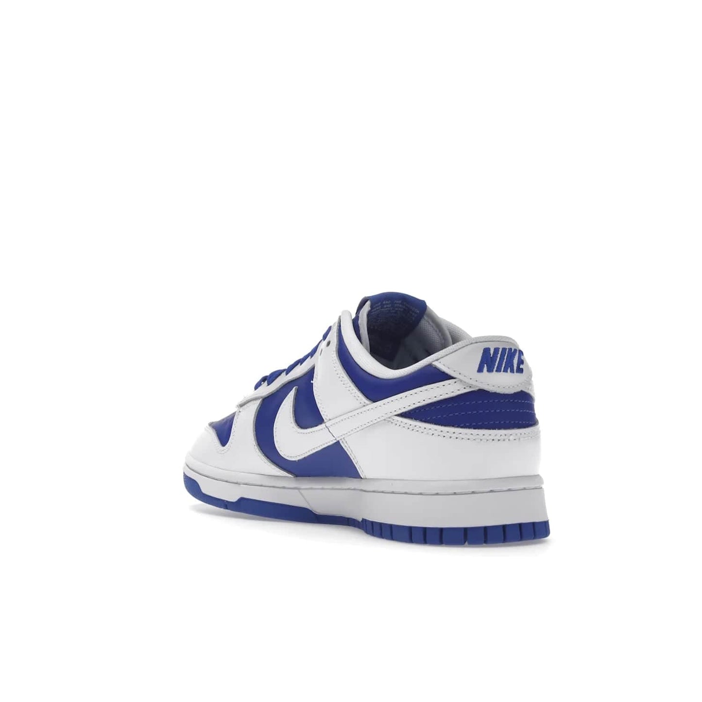 Nike Dunk Low Racer Blue White - Image 25 - Only at www.BallersClubKickz.com - Sleek Racer Blue leather upper and white leather overlays make up the Nike Dunk Low Racer Blue White. Woven tag and heel embroidery for a 1985 Dunk look with a matching EVA foam sole completes the classic colorway.