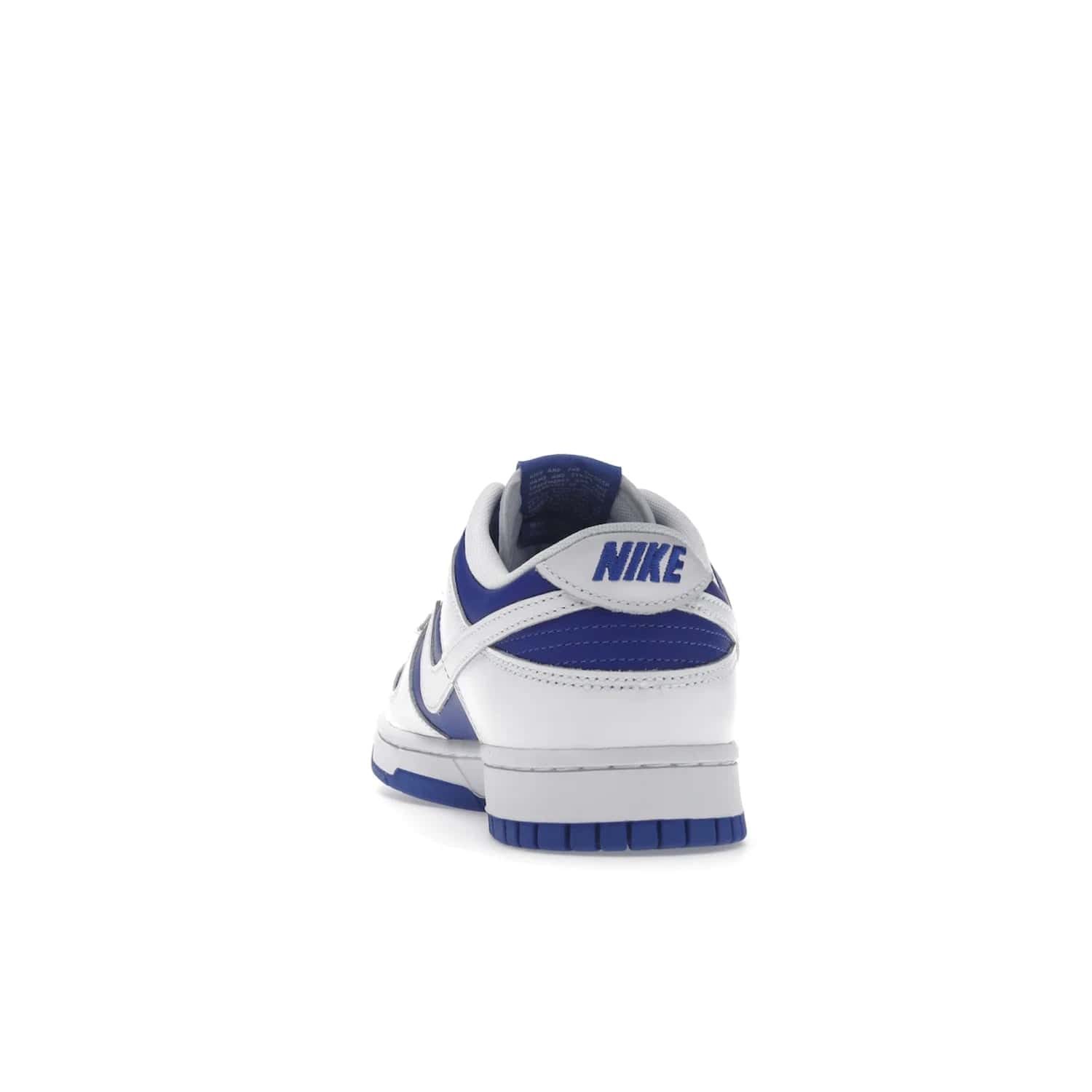Nike Dunk Low Racer Blue White - Image 27 - Only at www.BallersClubKickz.com - Sleek Racer Blue leather upper and white leather overlays make up the Nike Dunk Low Racer Blue White. Woven tag and heel embroidery for a 1985 Dunk look with a matching EVA foam sole completes the classic colorway.