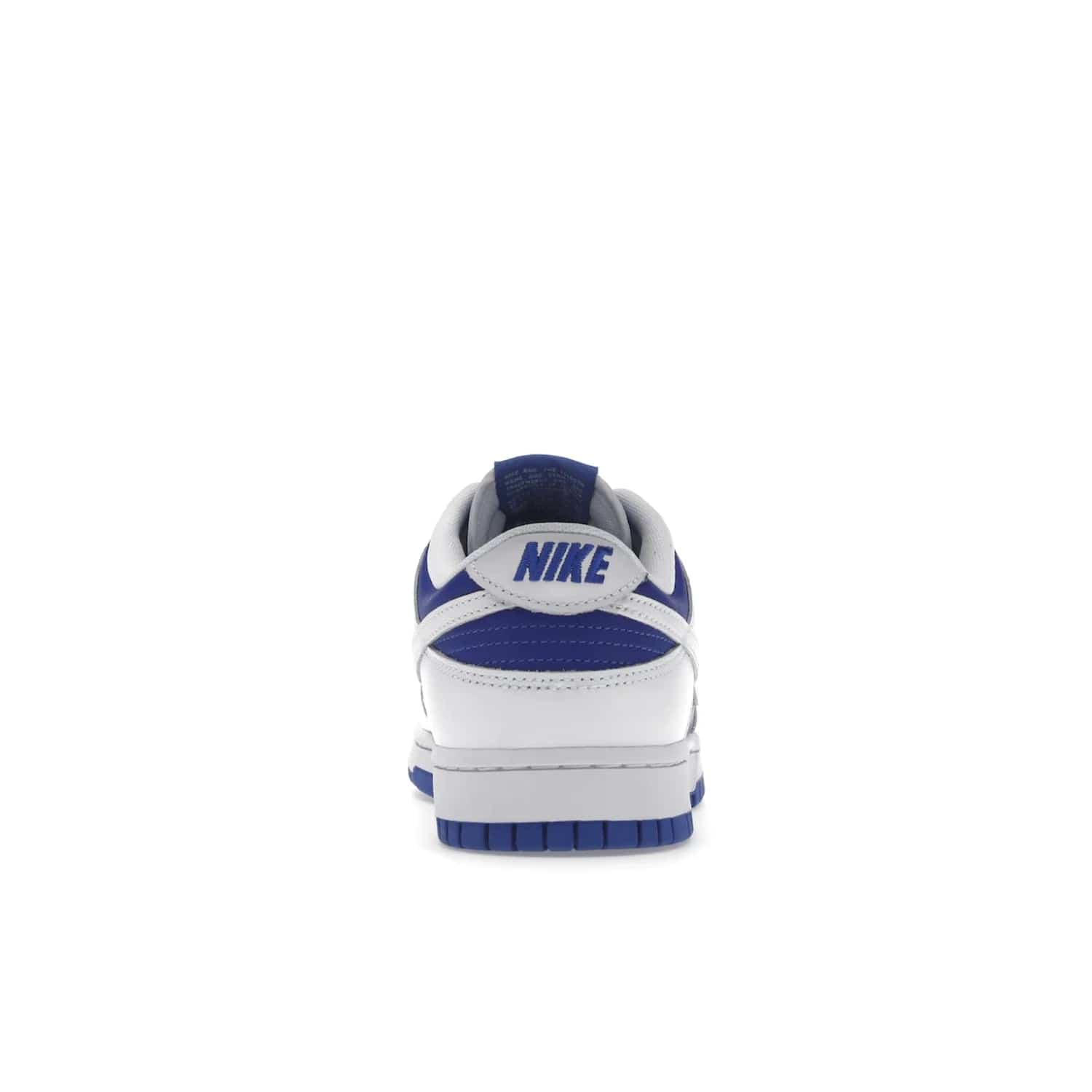 Nike Dunk Low Racer Blue White - Image 28 - Only at www.BallersClubKickz.com - Sleek Racer Blue leather upper and white leather overlays make up the Nike Dunk Low Racer Blue White. Woven tag and heel embroidery for a 1985 Dunk look with a matching EVA foam sole completes the classic colorway.