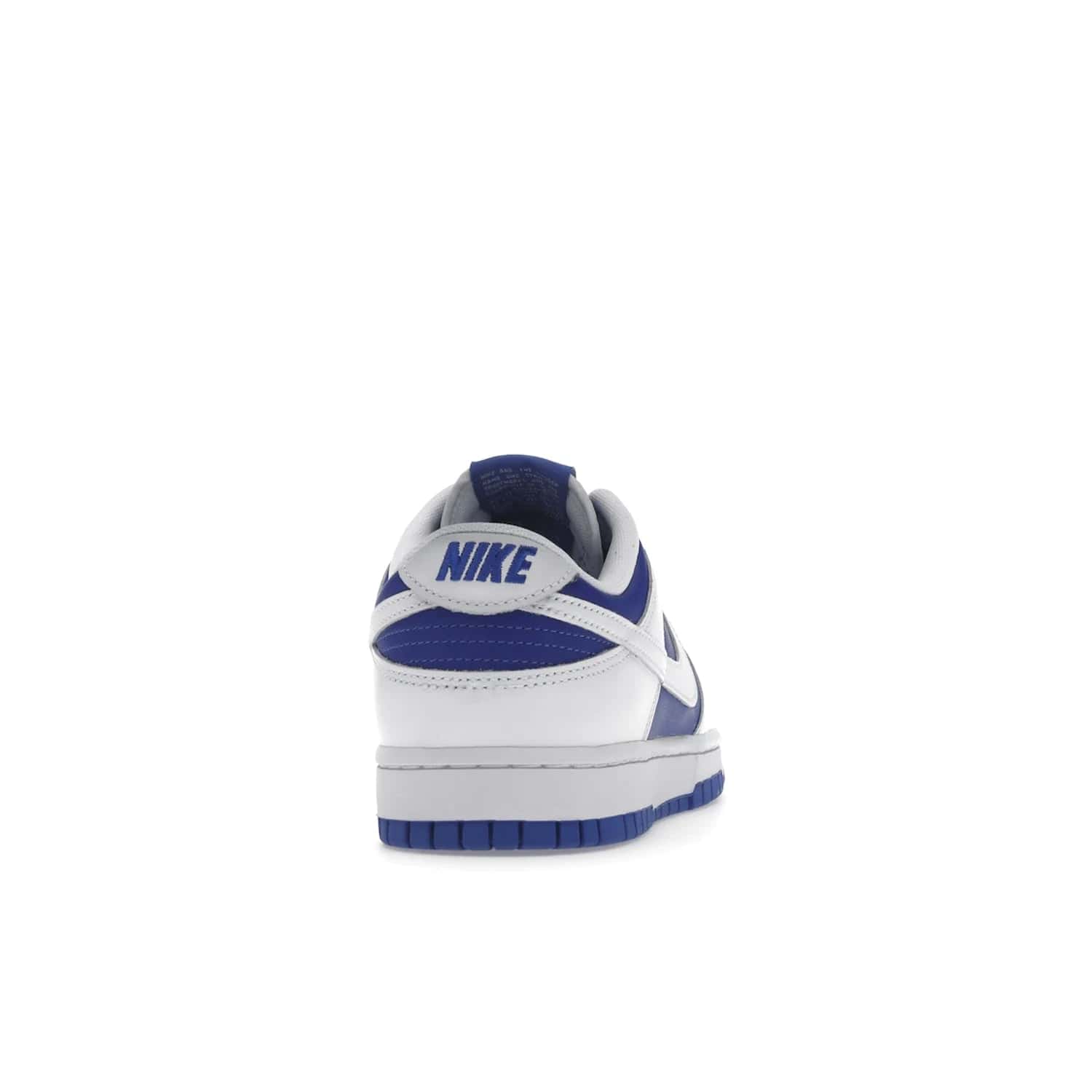 Nike Dunk Low Racer Blue White - Image 29 - Only at www.BallersClubKickz.com - Sleek Racer Blue leather upper and white leather overlays make up the Nike Dunk Low Racer Blue White. Woven tag and heel embroidery for a 1985 Dunk look with a matching EVA foam sole completes the classic colorway.
