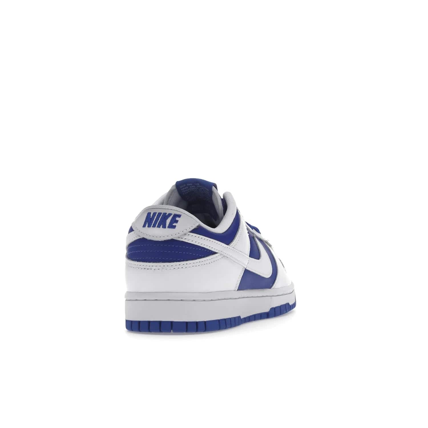 Nike Dunk Low Racer Blue White - Image 30 - Only at www.BallersClubKickz.com - Sleek Racer Blue leather upper and white leather overlays make up the Nike Dunk Low Racer Blue White. Woven tag and heel embroidery for a 1985 Dunk look with a matching EVA foam sole completes the classic colorway.