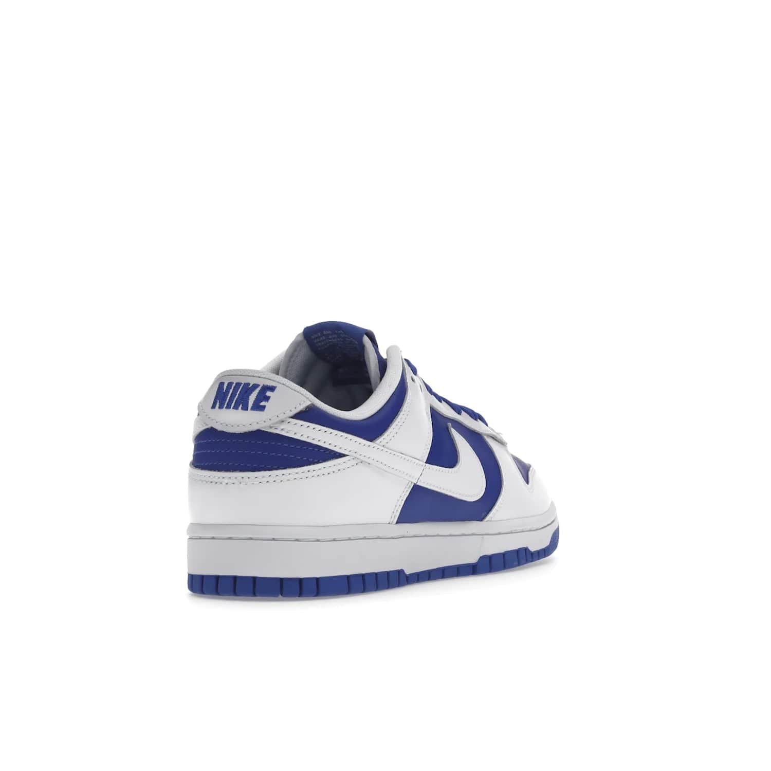 Nike Dunk Low Racer Blue White - Image 31 - Only at www.BallersClubKickz.com - Sleek Racer Blue leather upper and white leather overlays make up the Nike Dunk Low Racer Blue White. Woven tag and heel embroidery for a 1985 Dunk look with a matching EVA foam sole completes the classic colorway.
