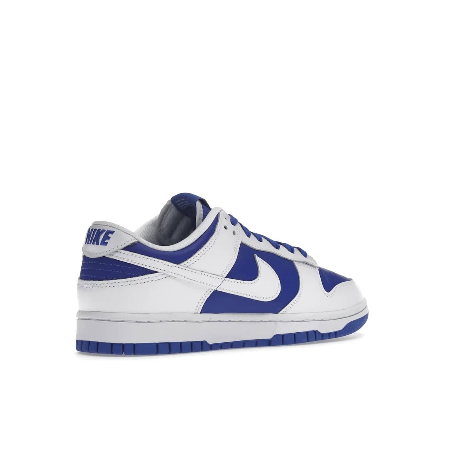 Nike Dunk Low Racer Blue White - Image 33 - Only at www.BallersClubKickz.com - Sleek Racer Blue leather upper and white leather overlays make up the Nike Dunk Low Racer Blue White. Woven tag and heel embroidery for a 1985 Dunk look with a matching EVA foam sole completes the classic colorway.