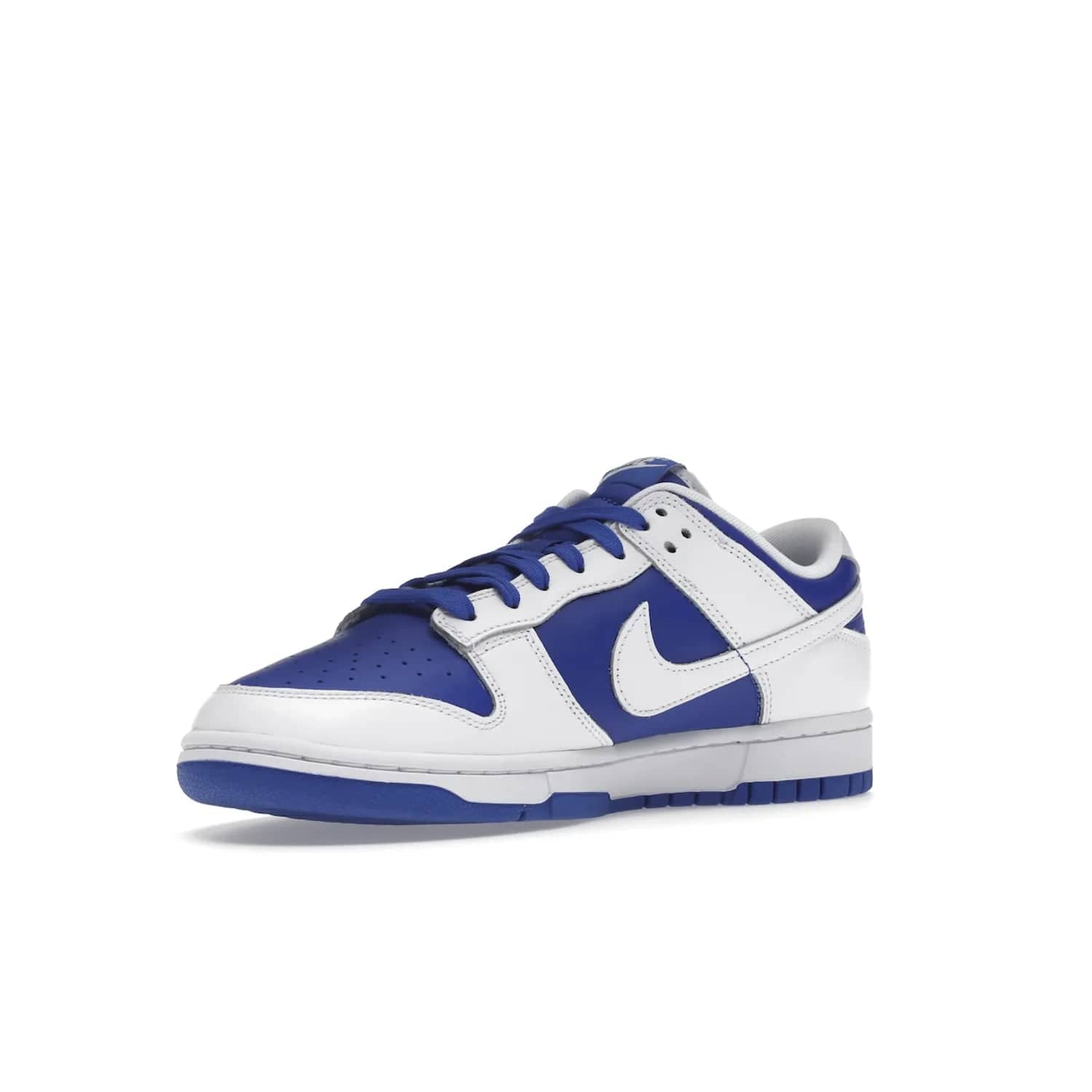 Nike Dunk Low Racer Blue White - Image 15 - Only at www.BallersClubKickz.com - Sleek Racer Blue leather upper and white leather overlays make up the Nike Dunk Low Racer Blue White. Woven tag and heel embroidery for a 1985 Dunk look with a matching EVA foam sole completes the classic colorway.