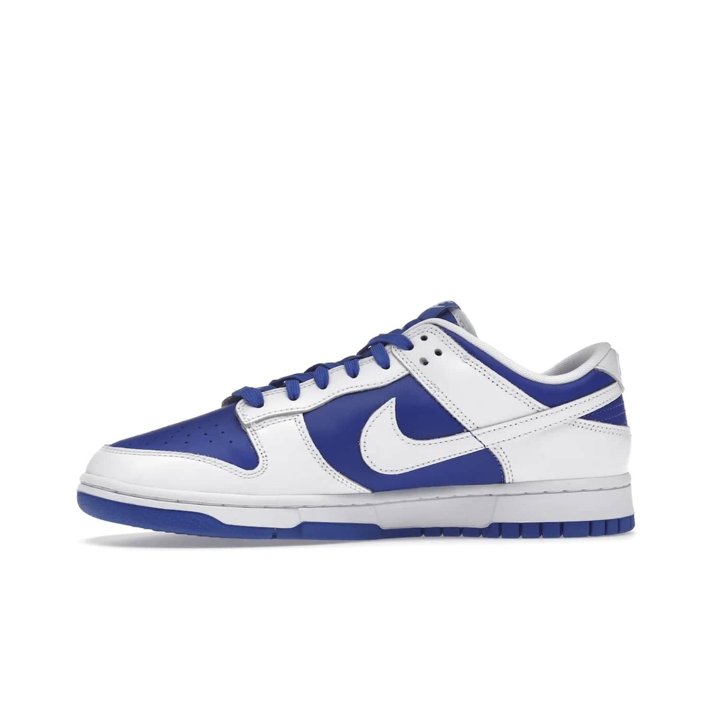 Nike Dunk Low Racer Blue White - Image 18 - Only at www.BallersClubKickz.com - Sleek Racer Blue leather upper and white leather overlays make up the Nike Dunk Low Racer Blue White. Woven tag and heel embroidery for a 1985 Dunk look with a matching EVA foam sole completes the classic colorway.