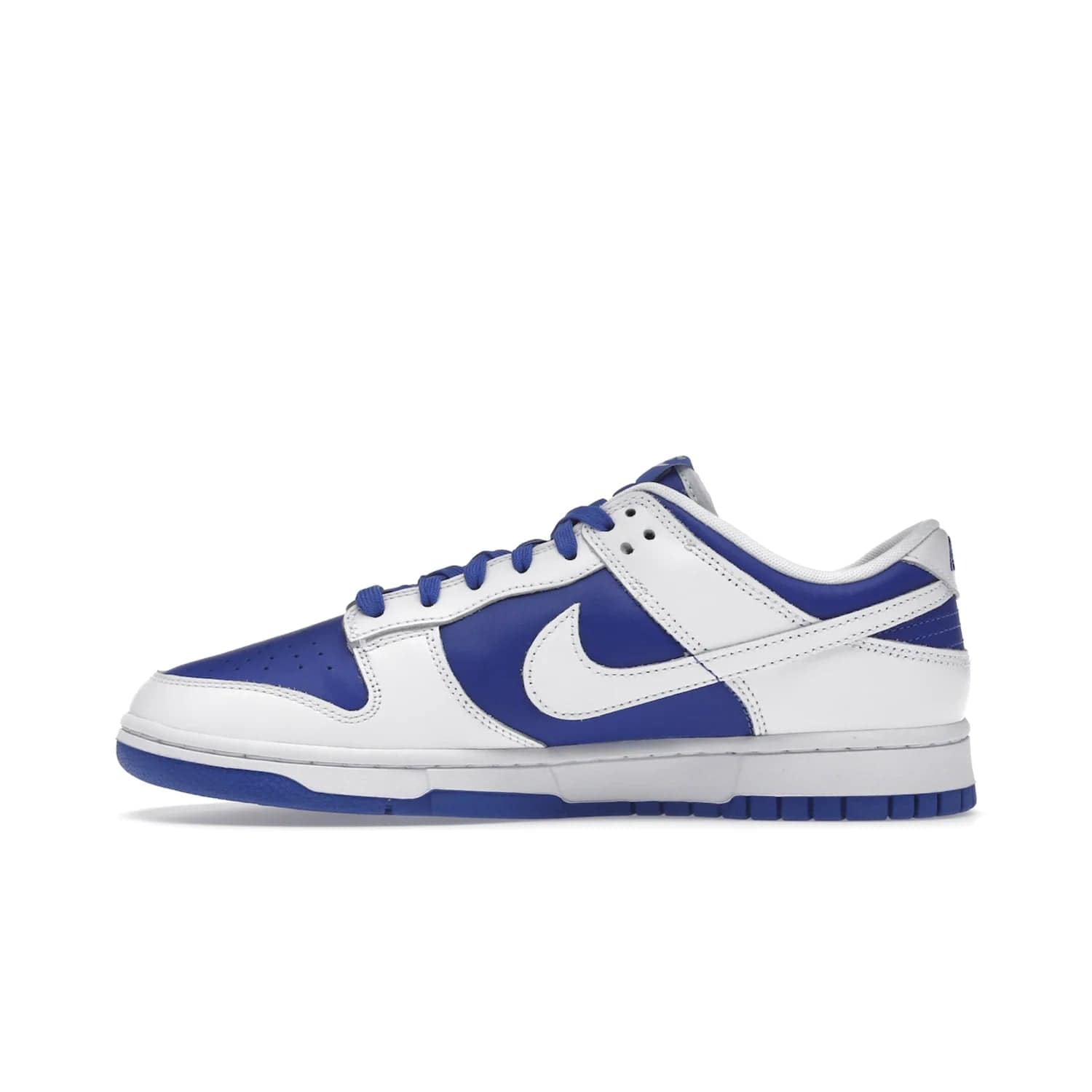 Nike Dunk Low Racer Blue White - Image 19 - Only at www.BallersClubKickz.com - Sleek Racer Blue leather upper and white leather overlays make up the Nike Dunk Low Racer Blue White. Woven tag and heel embroidery for a 1985 Dunk look with a matching EVA foam sole completes the classic colorway.