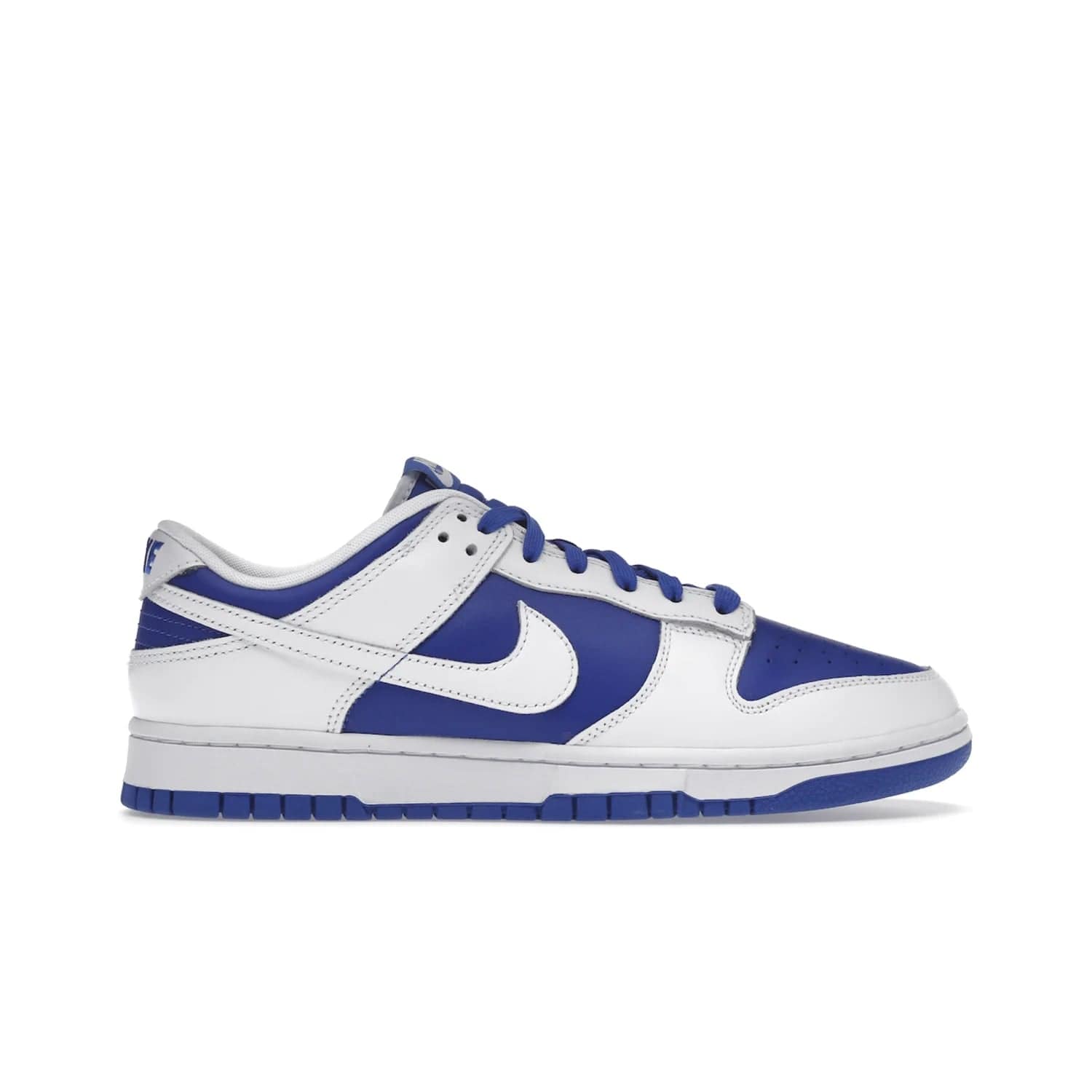 Nike Dunk Low Racer Blue White - Image 1 - Only at www.BallersClubKickz.com - Sleek Racer Blue leather upper and white leather overlays make up the Nike Dunk Low Racer Blue White. Woven tag and heel embroidery for a 1985 Dunk look with a matching EVA foam sole completes the classic colorway.