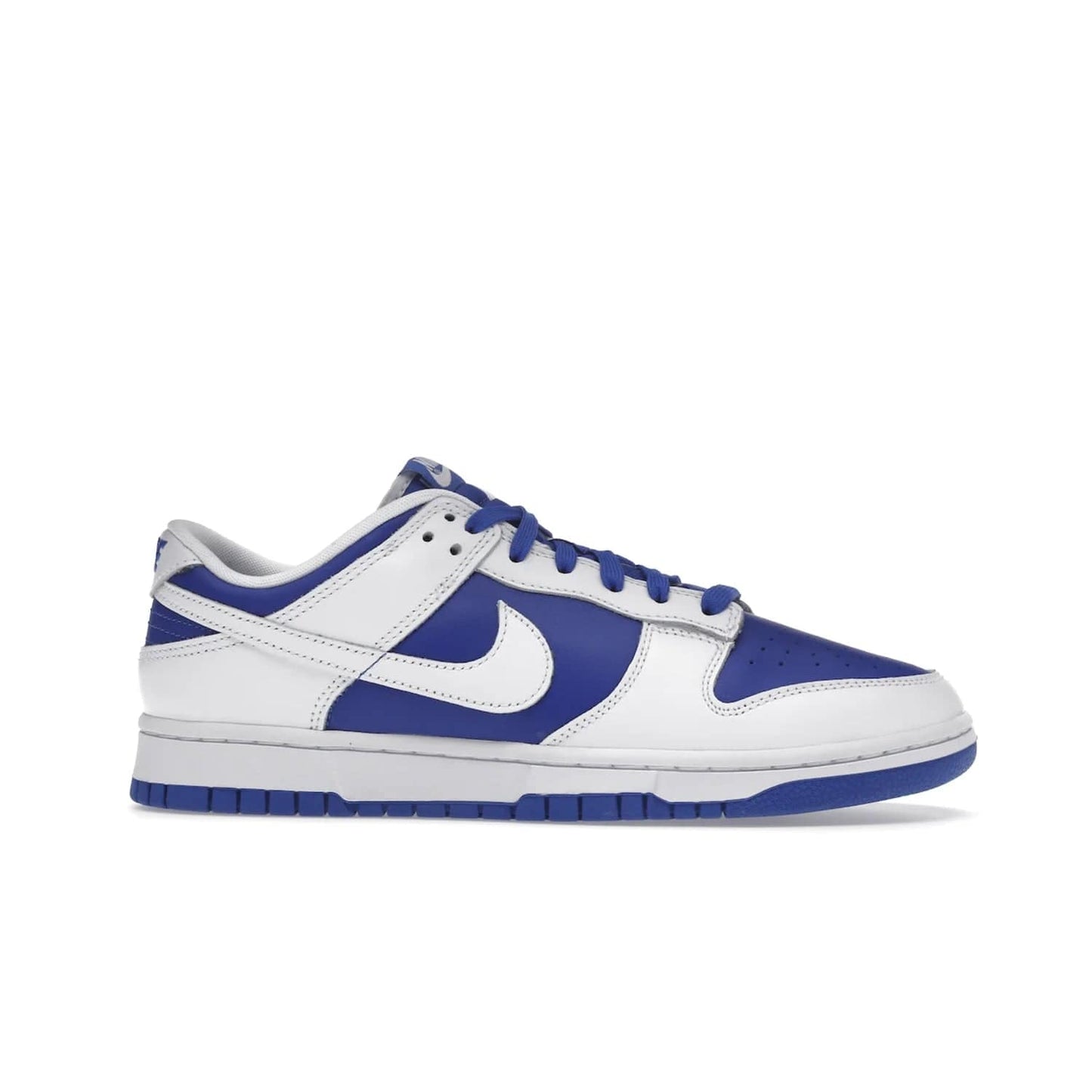 Nike Dunk Low Racer Blue White - Image 2 - Only at www.BallersClubKickz.com - Sleek Racer Blue leather upper and white leather overlays make up the Nike Dunk Low Racer Blue White. Woven tag and heel embroidery for a 1985 Dunk look with a matching EVA foam sole completes the classic colorway.