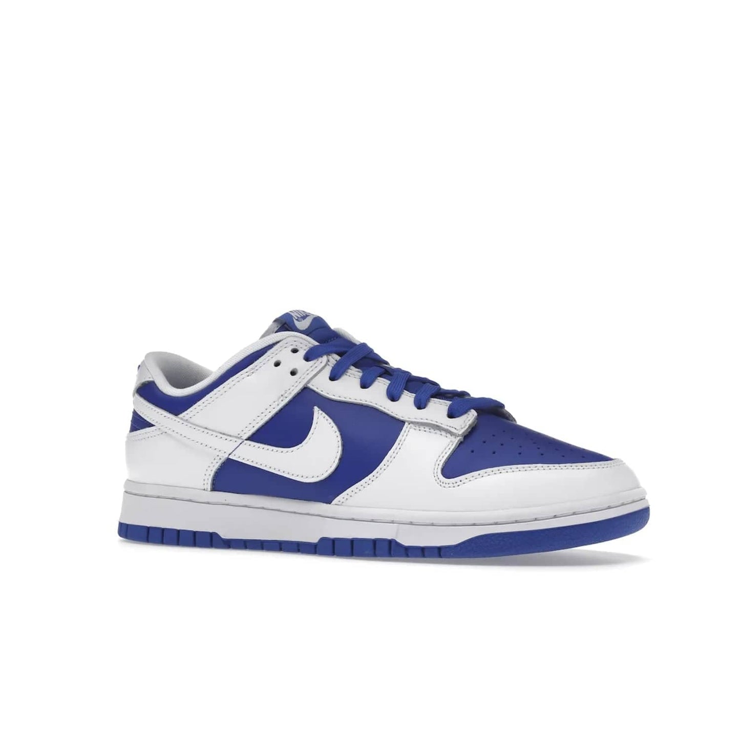 Nike Dunk Low Racer Blue White - Image 4 - Only at www.BallersClubKickz.com - Sleek Racer Blue leather upper and white leather overlays make up the Nike Dunk Low Racer Blue White. Woven tag and heel embroidery for a 1985 Dunk look with a matching EVA foam sole completes the classic colorway.