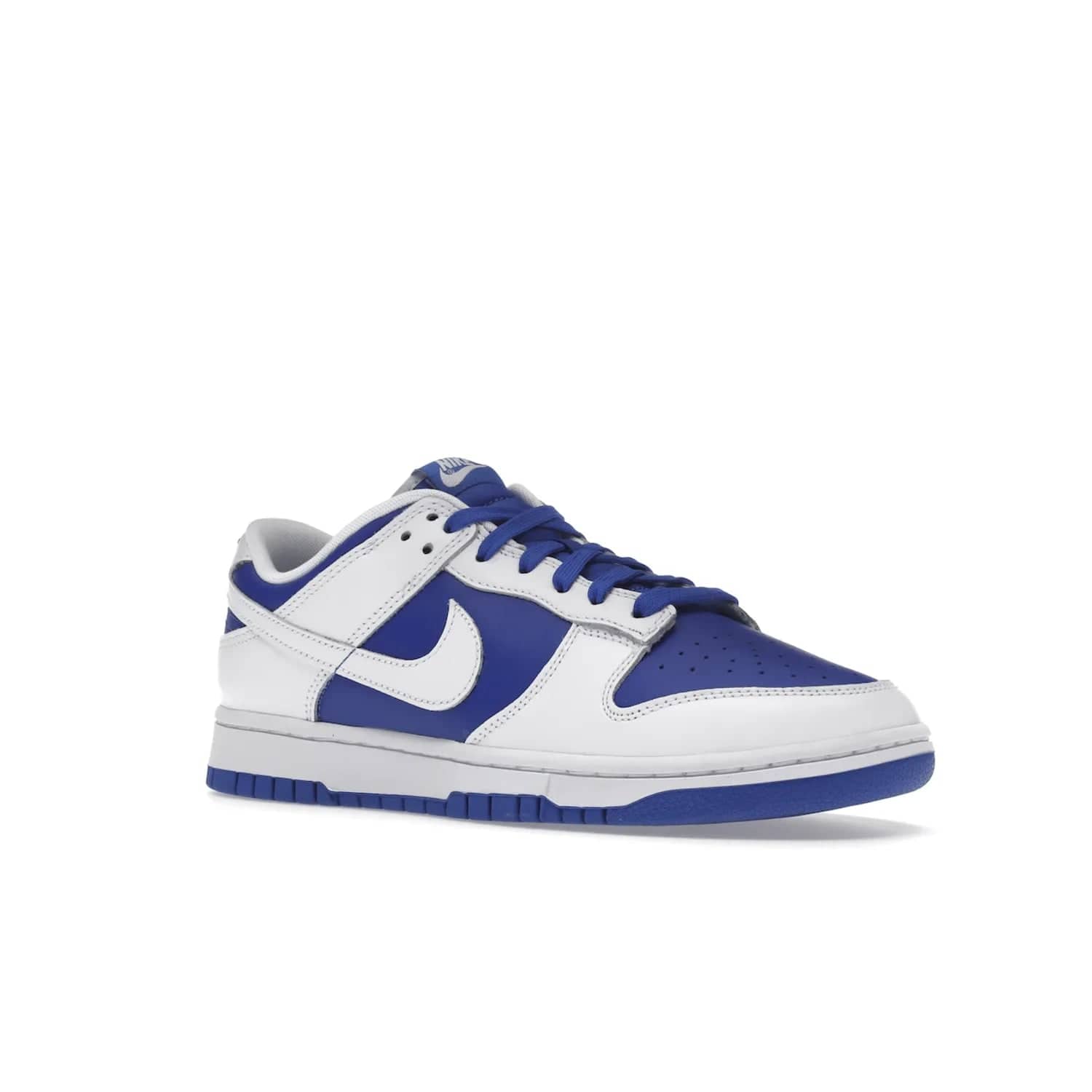 Nike Dunk Low Racer Blue White - Image 5 - Only at www.BallersClubKickz.com - Sleek Racer Blue leather upper and white leather overlays make up the Nike Dunk Low Racer Blue White. Woven tag and heel embroidery for a 1985 Dunk look with a matching EVA foam sole completes the classic colorway.