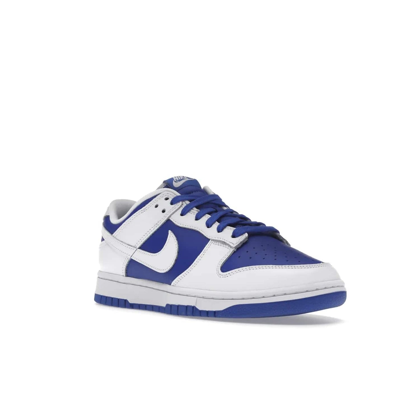 Nike Dunk Low Racer Blue White - Image 6 - Only at www.BallersClubKickz.com - Sleek Racer Blue leather upper and white leather overlays make up the Nike Dunk Low Racer Blue White. Woven tag and heel embroidery for a 1985 Dunk look with a matching EVA foam sole completes the classic colorway.