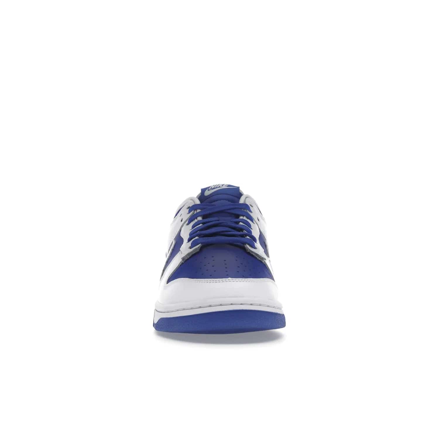 Nike Dunk Low Racer Blue White - Image 10 - Only at www.BallersClubKickz.com - Sleek Racer Blue leather upper and white leather overlays make up the Nike Dunk Low Racer Blue White. Woven tag and heel embroidery for a 1985 Dunk look with a matching EVA foam sole completes the classic colorway.