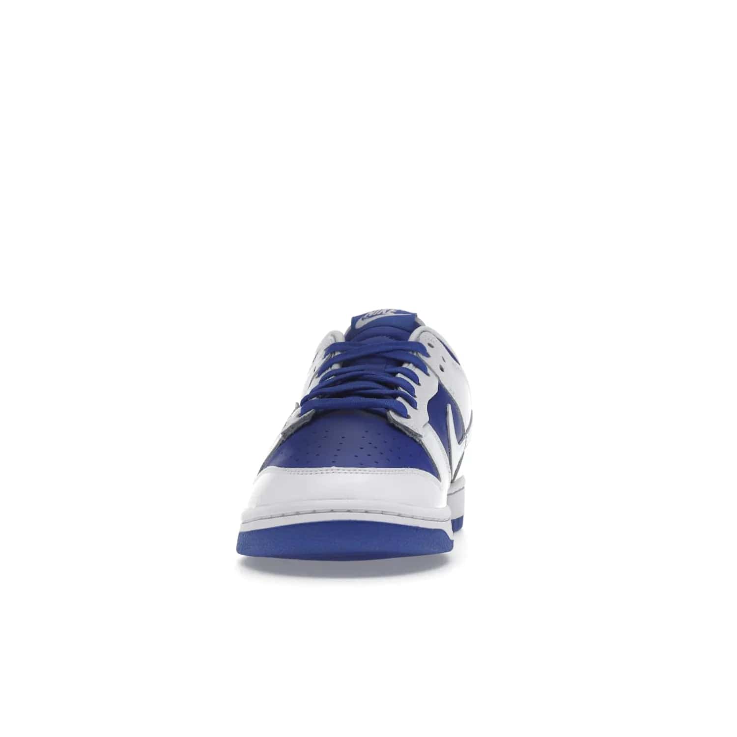Nike Dunk Low Racer Blue White - Image 11 - Only at www.BallersClubKickz.com - Sleek Racer Blue leather upper and white leather overlays make up the Nike Dunk Low Racer Blue White. Woven tag and heel embroidery for a 1985 Dunk look with a matching EVA foam sole completes the classic colorway.