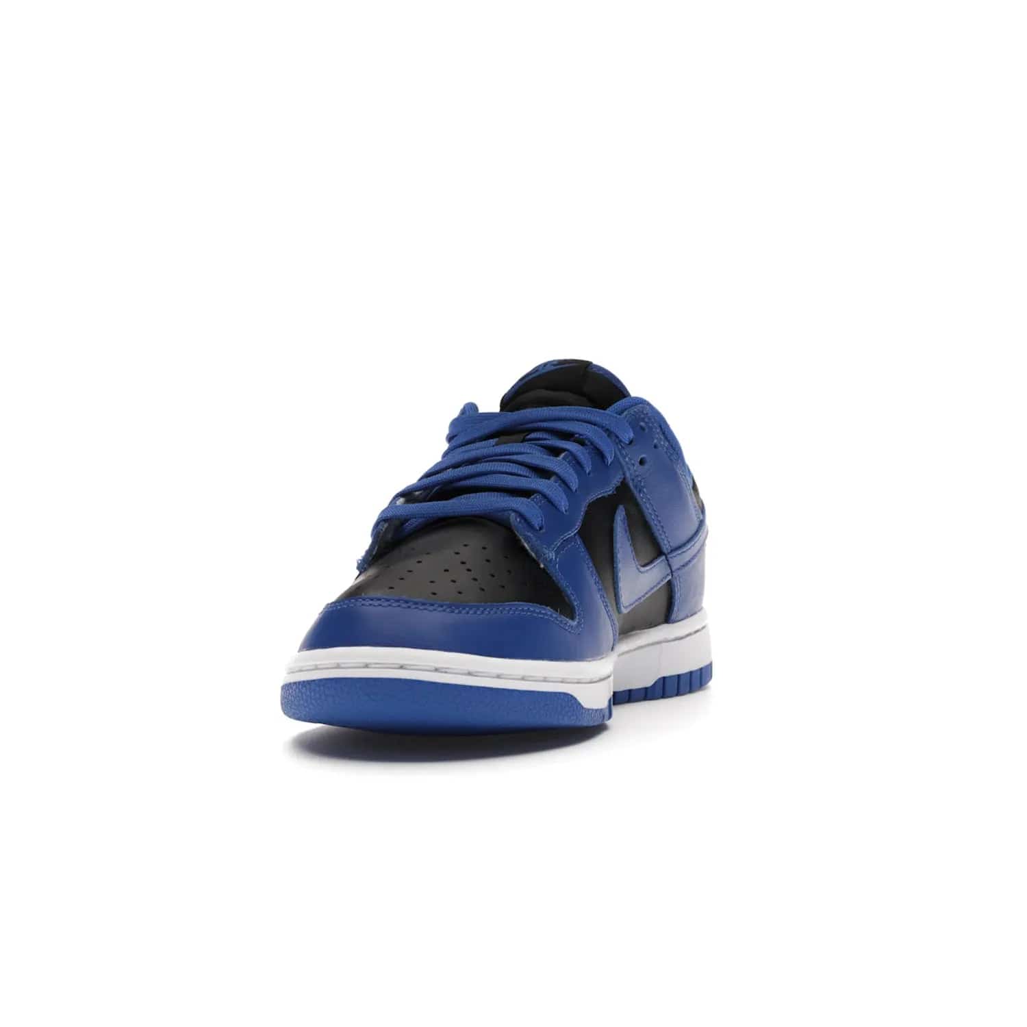 Nike Dunk Low Retro Black Hyper Cobalt (2021) - Image 12 - Only at www.BallersClubKickz.com - New limited-release Nike Dunk Low Retro Black/Hyper Cobalt (2021). The upper features a mix of black and hyper cobalt leather overlays, a classic basketball design and embroidered black "NIKE" branding. Get the shoe now for $100 and make a statement.