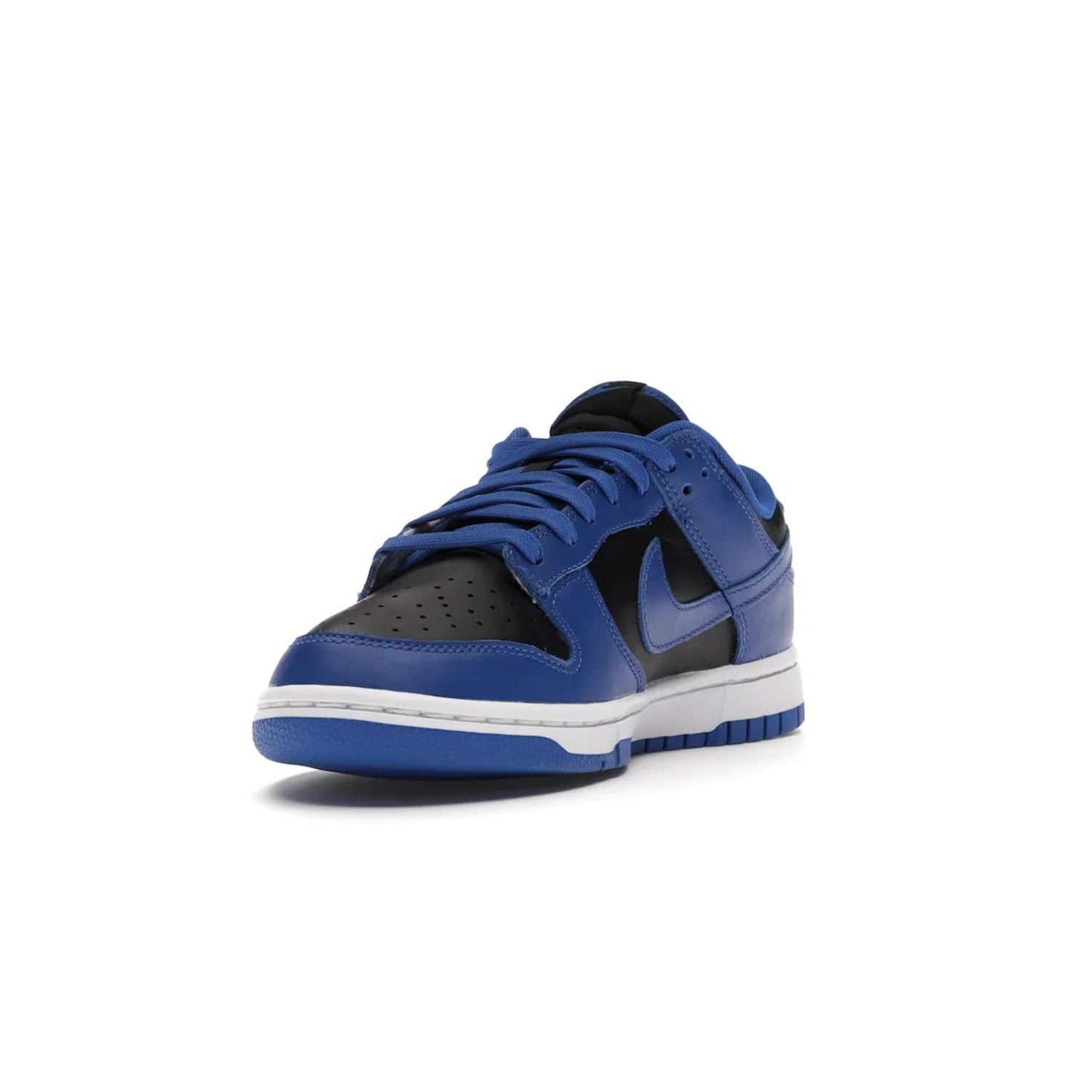 Nike Dunk Low Retro Black Hyper Cobalt (2021) - Image 13 - Only at www.BallersClubKickz.com - New limited-release Nike Dunk Low Retro Black/Hyper Cobalt (2021). The upper features a mix of black and hyper cobalt leather overlays, a classic basketball design and embroidered black "NIKE" branding. Get the shoe now for $100 and make a statement.