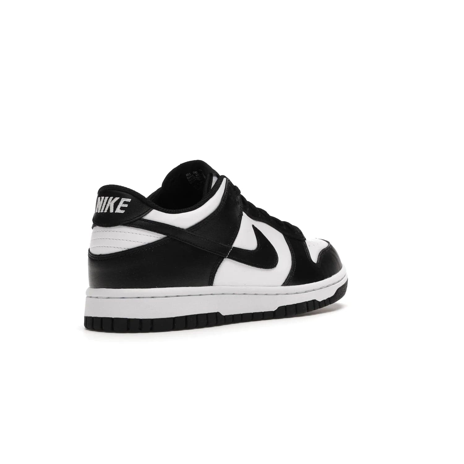 Nike Dunk Low Retro White Black Panda (2021) (GS) - Image 32 - Only at www.BallersClubKickz.com - Upgrade your style with the Nike Dunk Low Retro White Black (GS). Featuring premium leather, iconic Nike text, signature Swoosh logo and striking black/white colorway, this striking silhouette is the perfect mix of style and comfort. Colorway released in March 2021.