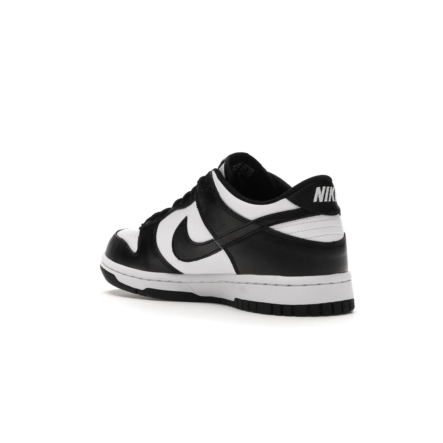 Nike Dunk Low Retro White Black Panda (2021) (GS) - Image 24 - Only at www.BallersClubKickz.com - Upgrade your style with the Nike Dunk Low Retro White Black (GS). Featuring premium leather, iconic Nike text, signature Swoosh logo and striking black/white colorway, this striking silhouette is the perfect mix of style and comfort. Colorway released in March 2021.
