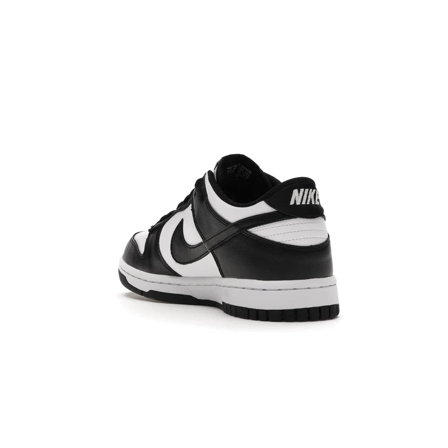 Nike Dunk Low Retro White Black Panda (2021) (GS) - Image 25 - Only at www.BallersClubKickz.com - Upgrade your style with the Nike Dunk Low Retro White Black (GS). Featuring premium leather, iconic Nike text, signature Swoosh logo and striking black/white colorway, this striking silhouette is the perfect mix of style and comfort. Colorway released in March 2021.