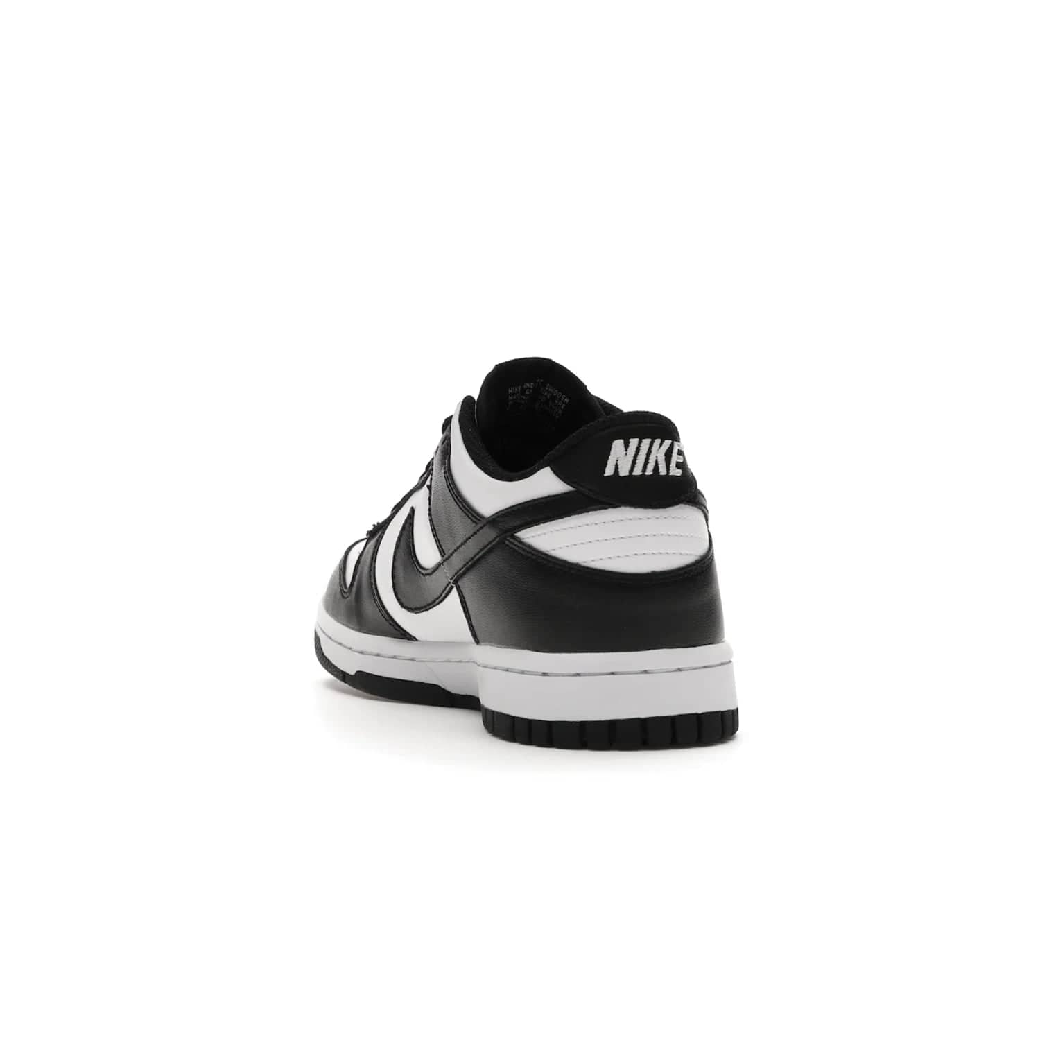 Nike Dunk Low Retro White Black Panda (2021) (GS) - Image 26 - Only at www.BallersClubKickz.com - Upgrade your style with the Nike Dunk Low Retro White Black (GS). Featuring premium leather, iconic Nike text, signature Swoosh logo and striking black/white colorway, this striking silhouette is the perfect mix of style and comfort. Colorway released in March 2021.