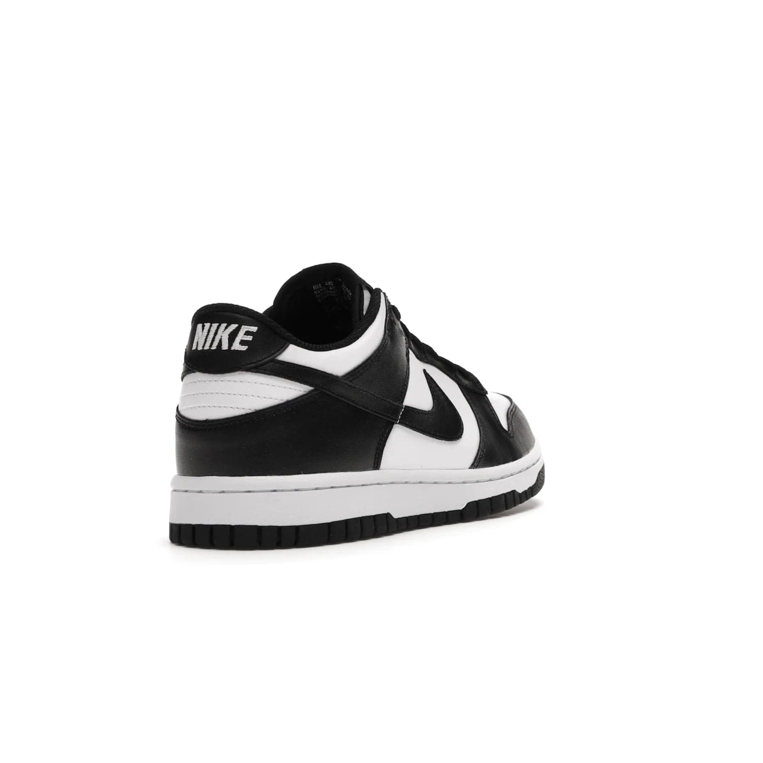 Nike Dunk Low Retro White Black Panda (2021) (GS) - Image 31 - Only at www.BallersClubKickz.com - Upgrade your style with the Nike Dunk Low Retro White Black (GS). Featuring premium leather, iconic Nike text, signature Swoosh logo and striking black/white colorway, this striking silhouette is the perfect mix of style and comfort. Colorway released in March 2021.