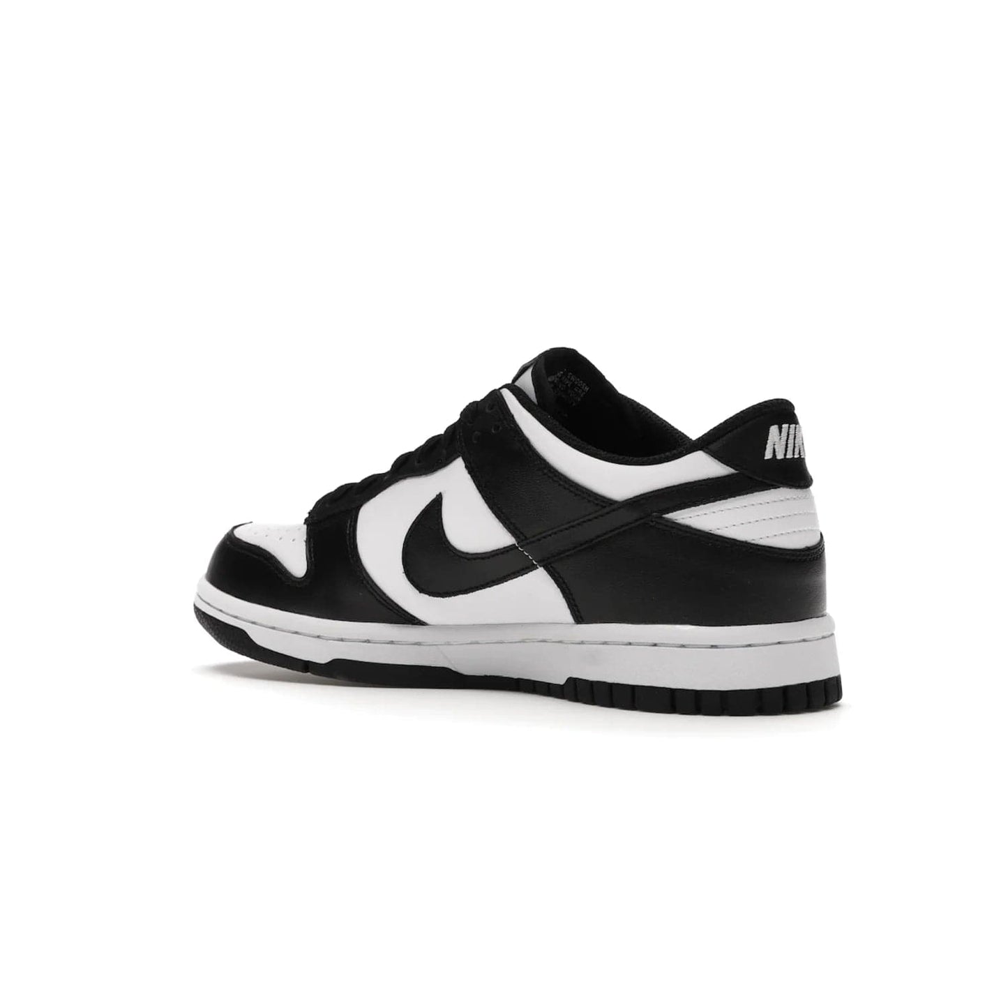 Nike Dunk Low Retro White Black Panda (2021) (GS) - Image 23 - Only at www.BallersClubKickz.com - Upgrade your style with the Nike Dunk Low Retro White Black (GS). Featuring premium leather, iconic Nike text, signature Swoosh logo and striking black/white colorway, this striking silhouette is the perfect mix of style and comfort. Colorway released in March 2021.
