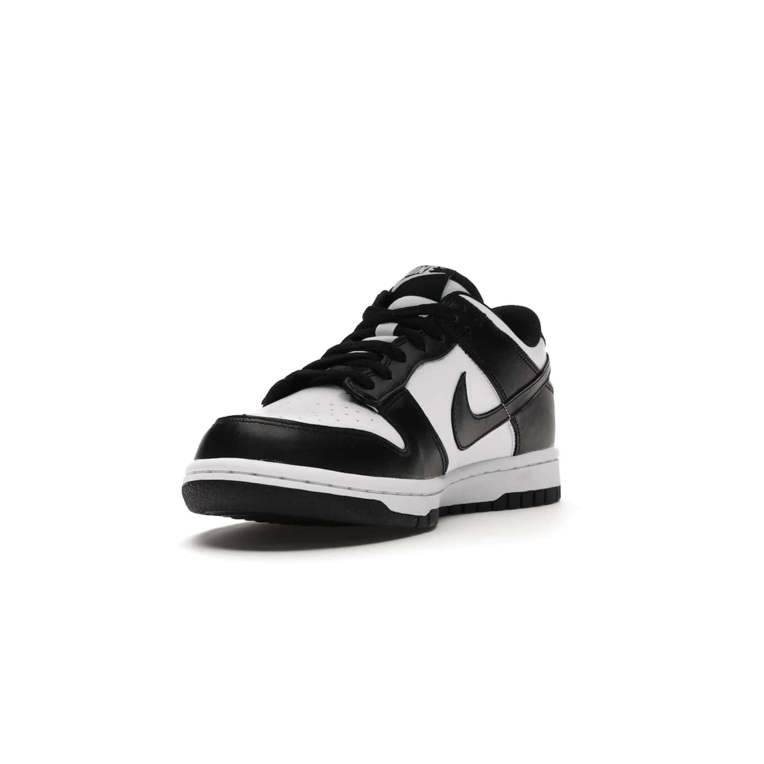 Nike Dunk Low Retro White Black Panda (2021) (GS) - Image 13 - Only at www.BallersClubKickz.com - Upgrade your style with the Nike Dunk Low Retro White Black (GS). Featuring premium leather, iconic Nike text, signature Swoosh logo and striking black/white colorway, this striking silhouette is the perfect mix of style and comfort. Colorway released in March 2021.