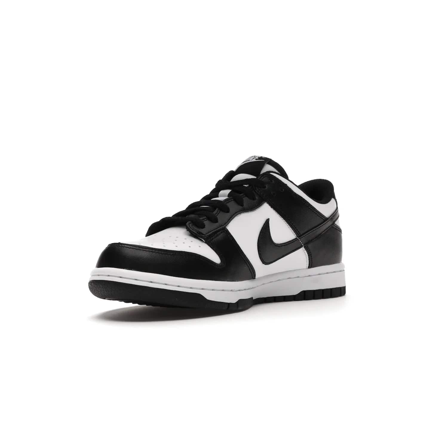 Nike Dunk Low Retro White Black Panda (2021) (GS) - Image 14 - Only at www.BallersClubKickz.com - Upgrade your style with the Nike Dunk Low Retro White Black (GS). Featuring premium leather, iconic Nike text, signature Swoosh logo and striking black/white colorway, this striking silhouette is the perfect mix of style and comfort. Colorway released in March 2021.