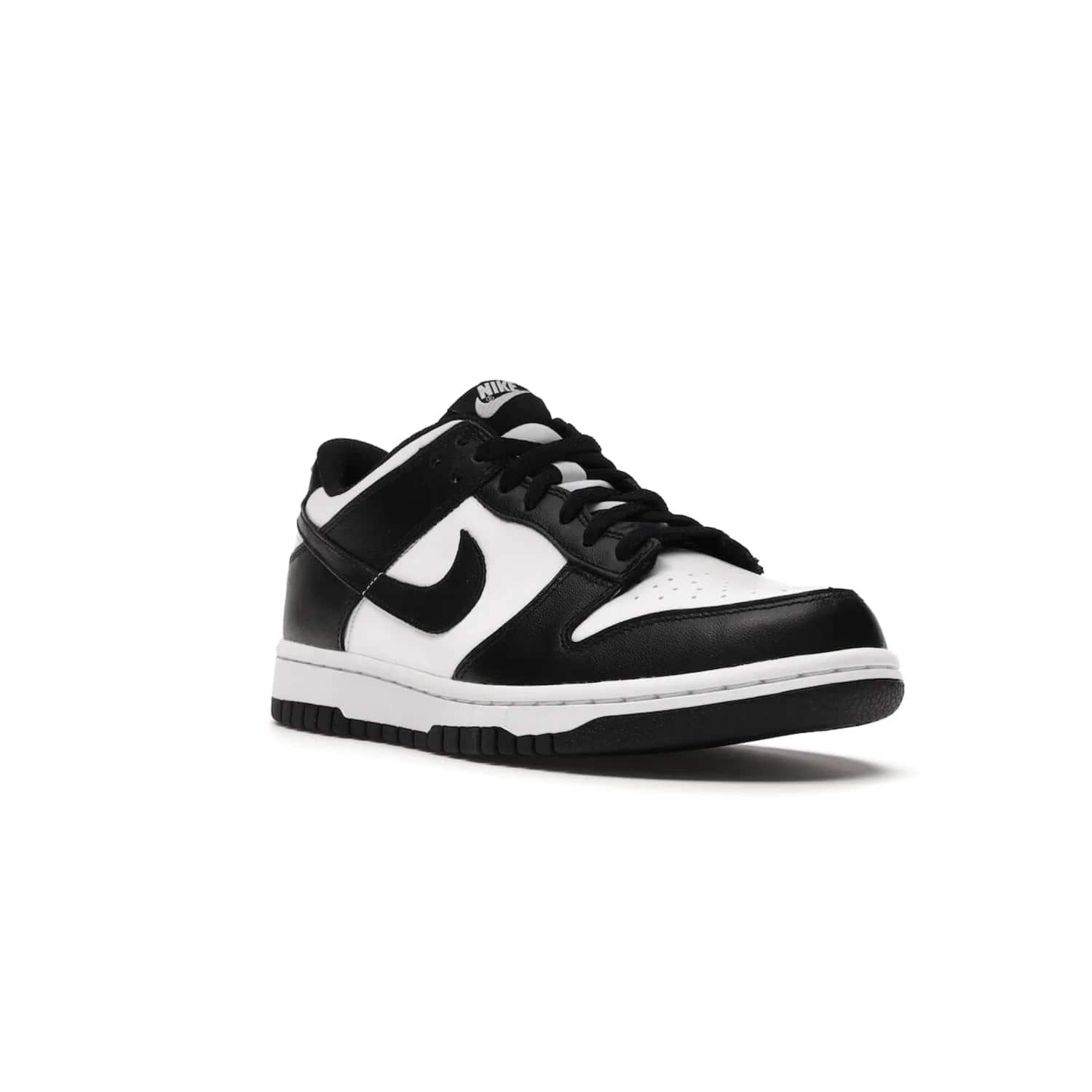Nike Dunk Low Retro White Black Panda (2021) (GS) - Image 6 - Only at www.BallersClubKickz.com - Upgrade your style with the Nike Dunk Low Retro White Black (GS). Featuring premium leather, iconic Nike text, signature Swoosh logo and striking black/white colorway, this striking silhouette is the perfect mix of style and comfort. Colorway released in March 2021.
