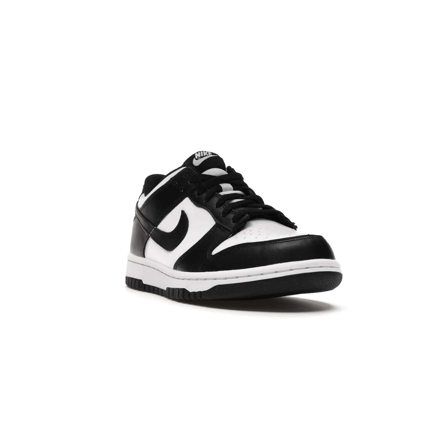 Nike Dunk Low Retro White Black Panda (2021) (GS) - Image 7 - Only at www.BallersClubKickz.com - Upgrade your style with the Nike Dunk Low Retro White Black (GS). Featuring premium leather, iconic Nike text, signature Swoosh logo and striking black/white colorway, this striking silhouette is the perfect mix of style and comfort. Colorway released in March 2021.