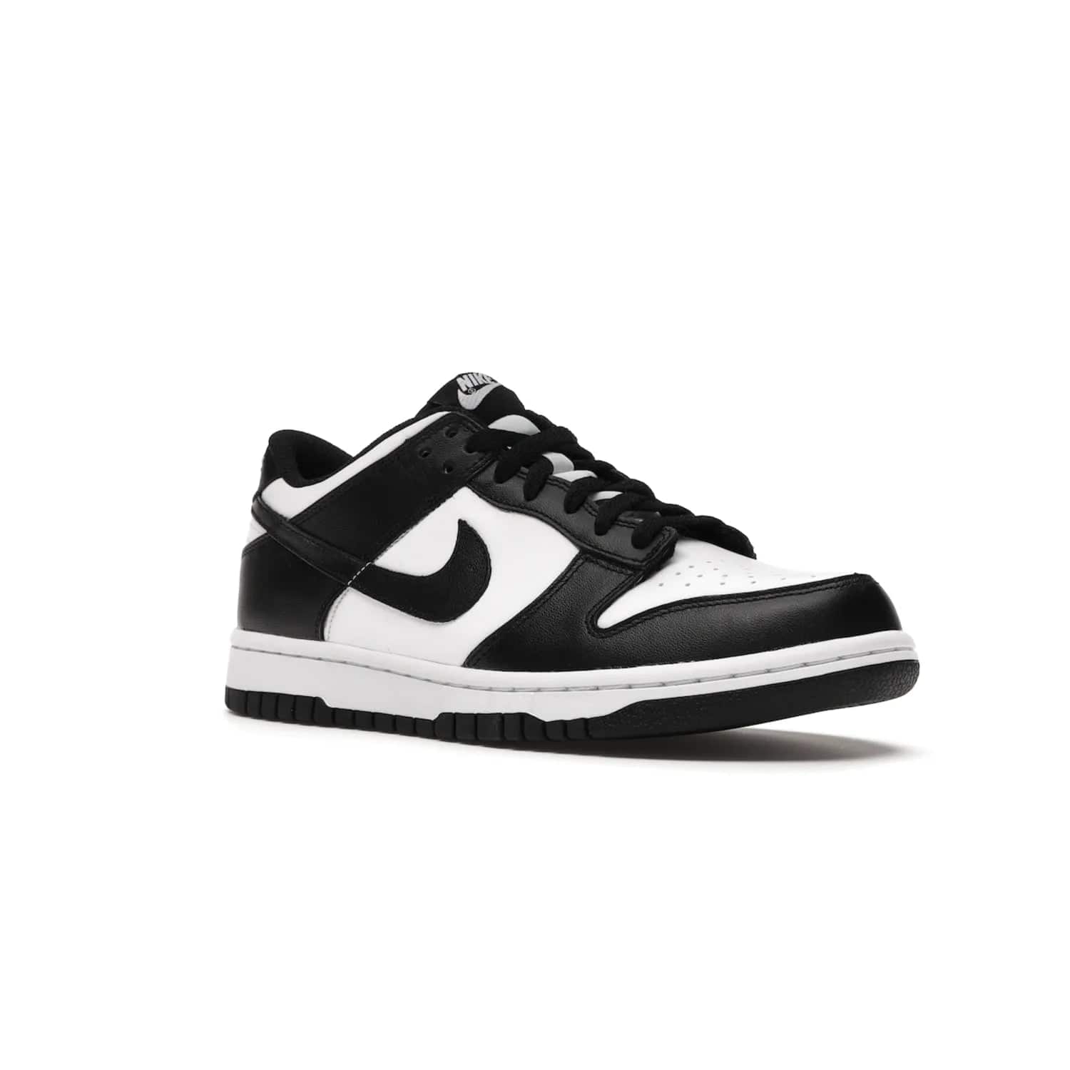 Nike Dunk Low Retro White Black Panda (2021) (GS) - Image 5 - Only at www.BallersClubKickz.com - Upgrade your style with the Nike Dunk Low Retro White Black (GS). Featuring premium leather, iconic Nike text, signature Swoosh logo and striking black/white colorway, this striking silhouette is the perfect mix of style and comfort. Colorway released in March 2021.