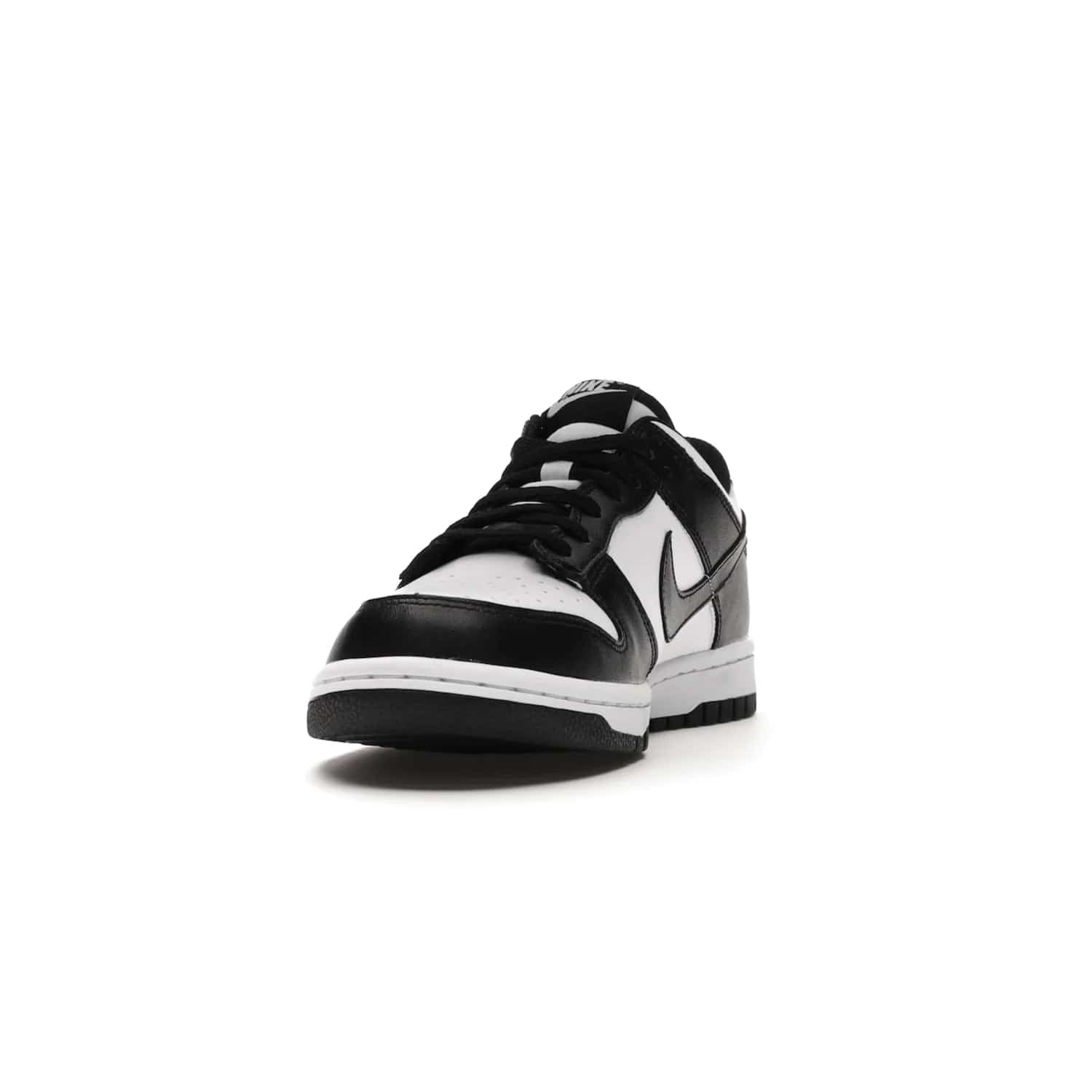 Nike Dunk Low Retro White Black Panda (2021) (GS) - Image 12 - Only at www.BallersClubKickz.com - Upgrade your style with the Nike Dunk Low Retro White Black (GS). Featuring premium leather, iconic Nike text, signature Swoosh logo and striking black/white colorway, this striking silhouette is the perfect mix of style and comfort. Colorway released in March 2021.