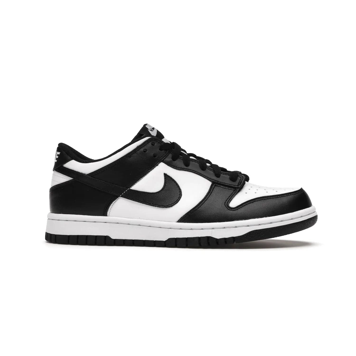 Nike Dunk Low Retro White Black Panda (2021) (GS) - Image 2 - Only at www.BallersClubKickz.com - Upgrade your style with the Nike Dunk Low Retro White Black (GS). Featuring premium leather, iconic Nike text, signature Swoosh logo and striking black/white colorway, this striking silhouette is the perfect mix of style and comfort. Colorway released in March 2021.