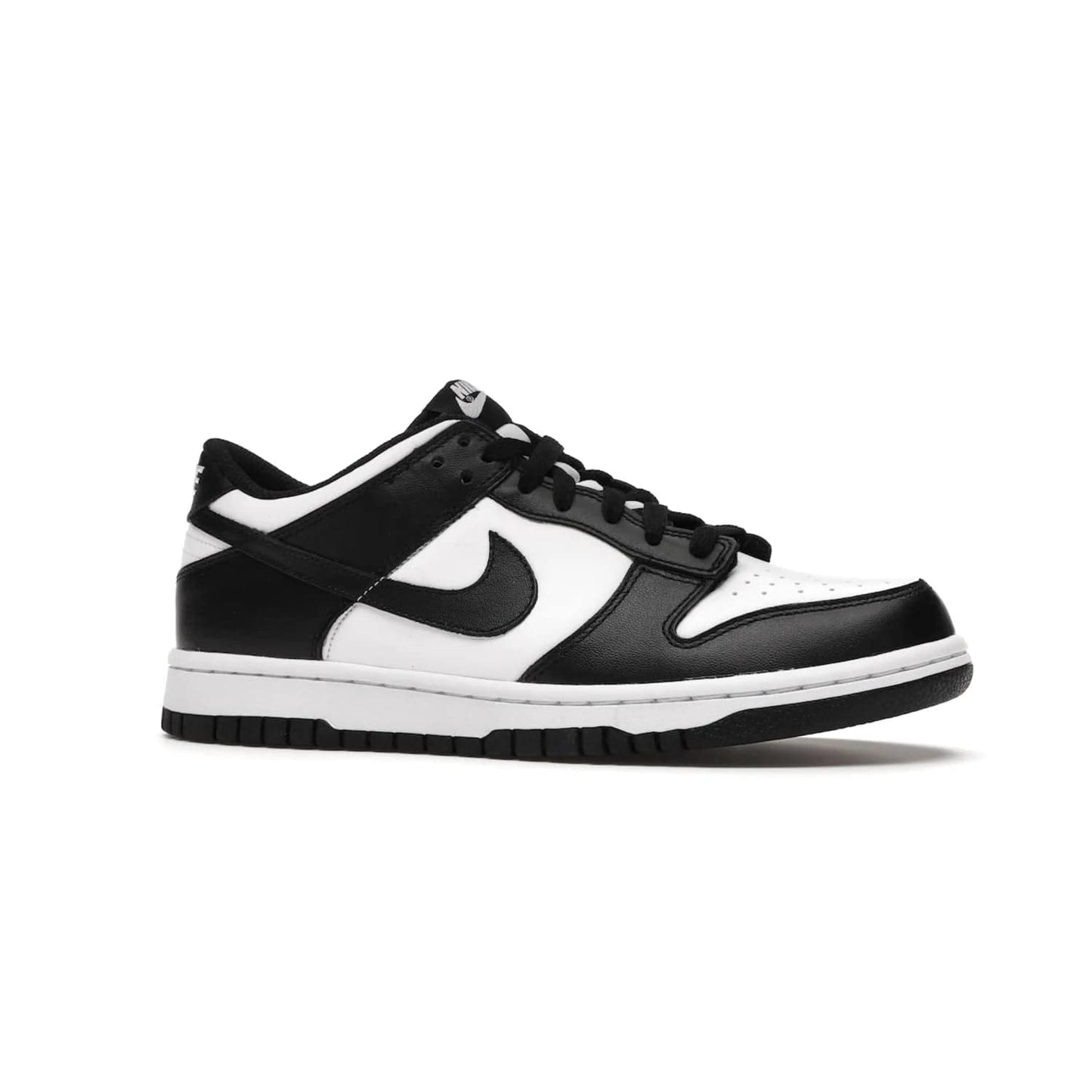 Nike Dunk Low Retro White Black Panda (2021) (GS) - Image 3 - Only at www.BallersClubKickz.com - Upgrade your style with the Nike Dunk Low Retro White Black (GS). Featuring premium leather, iconic Nike text, signature Swoosh logo and striking black/white colorway, this striking silhouette is the perfect mix of style and comfort. Colorway released in March 2021.