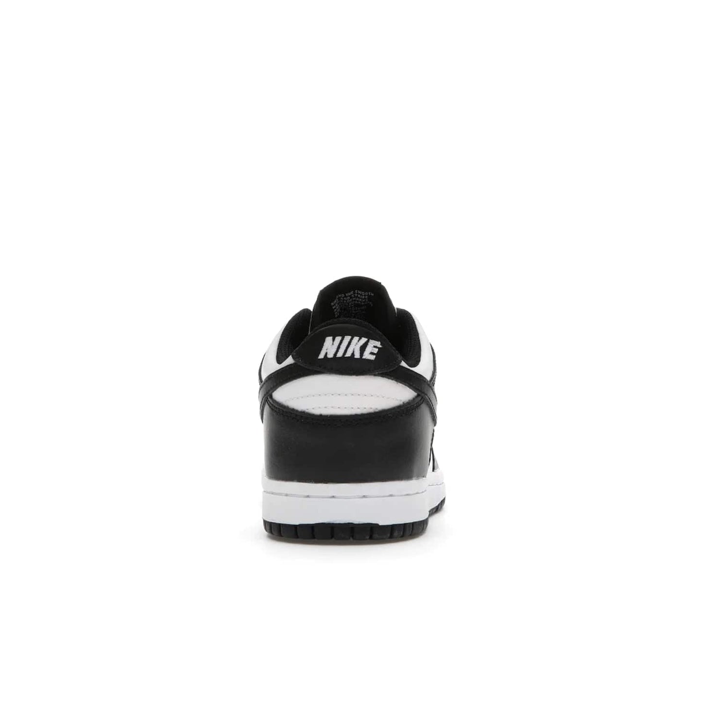 Nike Dunk Low Retro White Black Panda (2021) (PS) - Image 28 - Only at www.BallersClubKickz.com - Retro basketball style with modern updates: Nike Dunk Low PS White/Black. Find the classic sneaker with all-white leather upper, black overlays, black Swoosh branding an more. Originally released in March 2021.