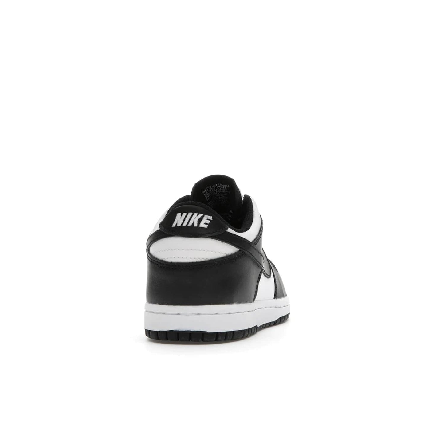 Nike Dunk Low Retro White Black Panda (2021) (PS) - Image 29 - Only at www.BallersClubKickz.com - Retro basketball style with modern updates: Nike Dunk Low PS White/Black. Find the classic sneaker with all-white leather upper, black overlays, black Swoosh branding an more. Originally released in March 2021.