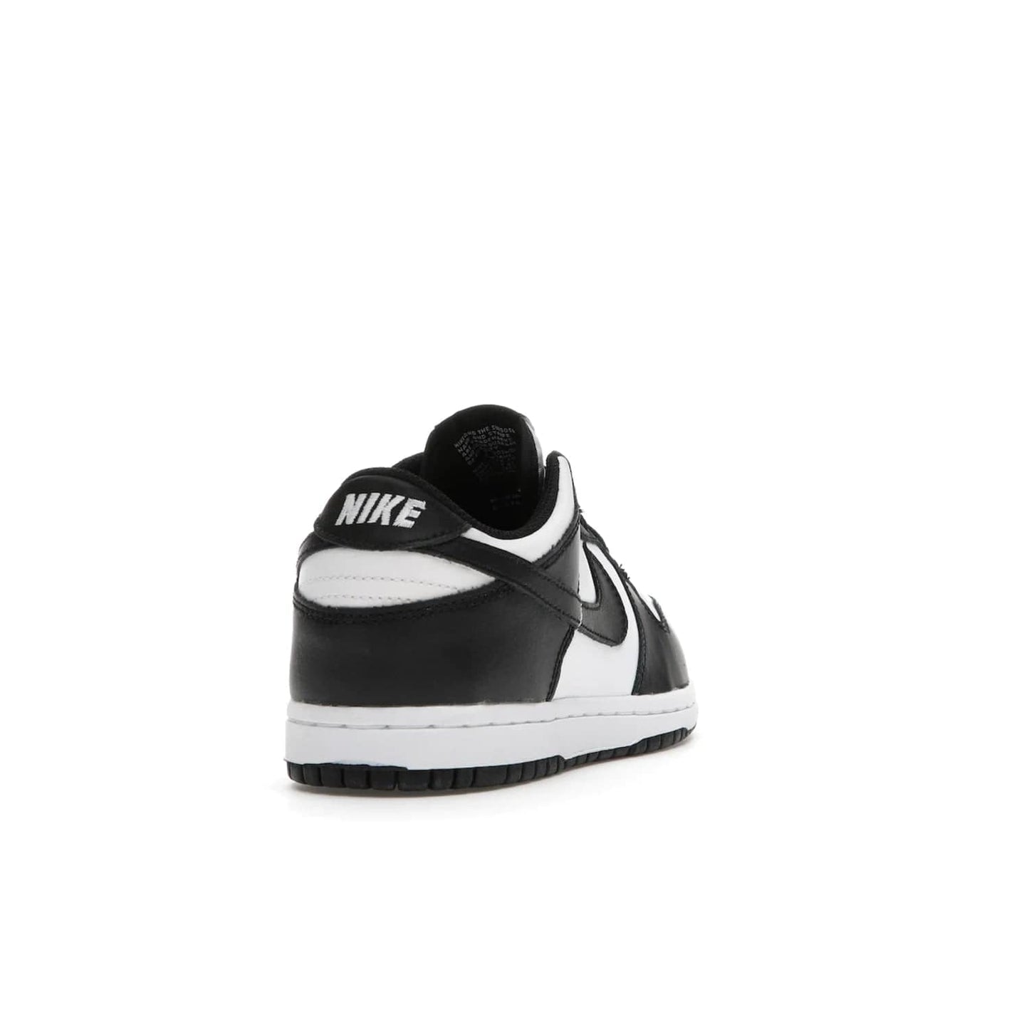 Nike Dunk Low Retro White Black Panda (2021) (PS) - Image 30 - Only at www.BallersClubKickz.com - Retro basketball style with modern updates: Nike Dunk Low PS White/Black. Find the classic sneaker with all-white leather upper, black overlays, black Swoosh branding an more. Originally released in March 2021.
