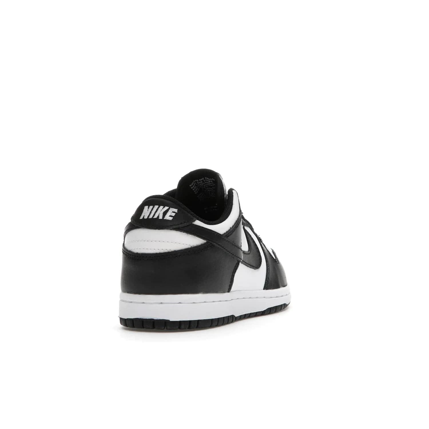 Nike Dunk Low Retro White Black Panda (2021) (PS) - Image 30 - Only at www.BallersClubKickz.com - Retro basketball style with modern updates: Nike Dunk Low PS White/Black. Find the classic sneaker with all-white leather upper, black overlays, black Swoosh branding an more. Originally released in March 2021.
