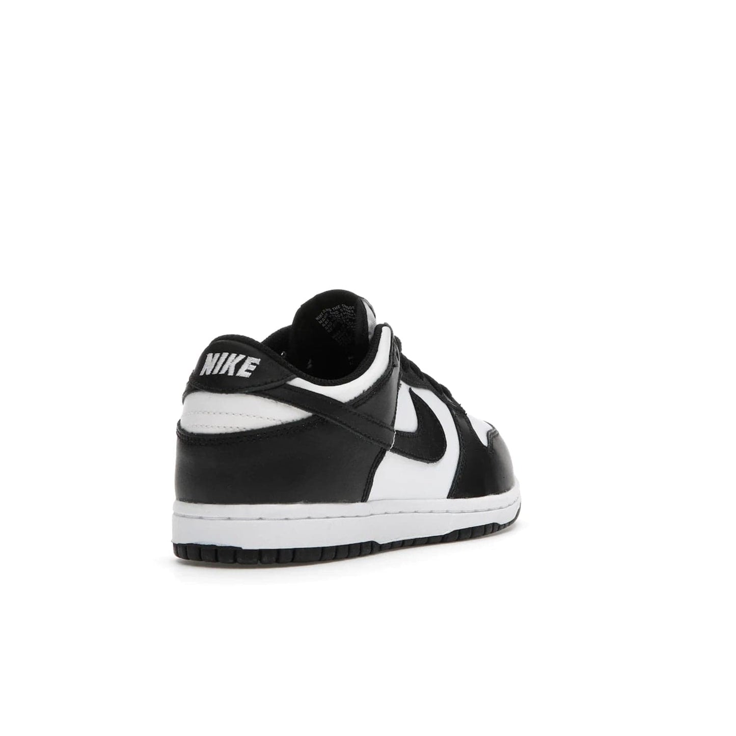 Nike Dunk Low Retro White Black Panda (2021) (PS) - Image 31 - Only at www.BallersClubKickz.com - Retro basketball style with modern updates: Nike Dunk Low PS White/Black. Find the classic sneaker with all-white leather upper, black overlays, black Swoosh branding an more. Originally released in March 2021.