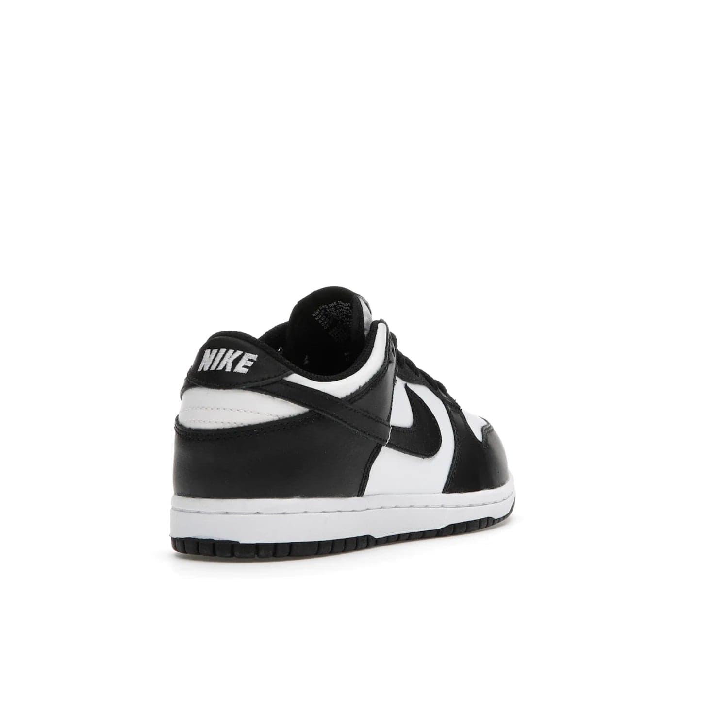 Nike Dunk Low Retro White Black Panda (2021) (PS) - Image 31 - Only at www.BallersClubKickz.com - Retro basketball style with modern updates: Nike Dunk Low PS White/Black. Find the classic sneaker with all-white leather upper, black overlays, black Swoosh branding an more. Originally released in March 2021.