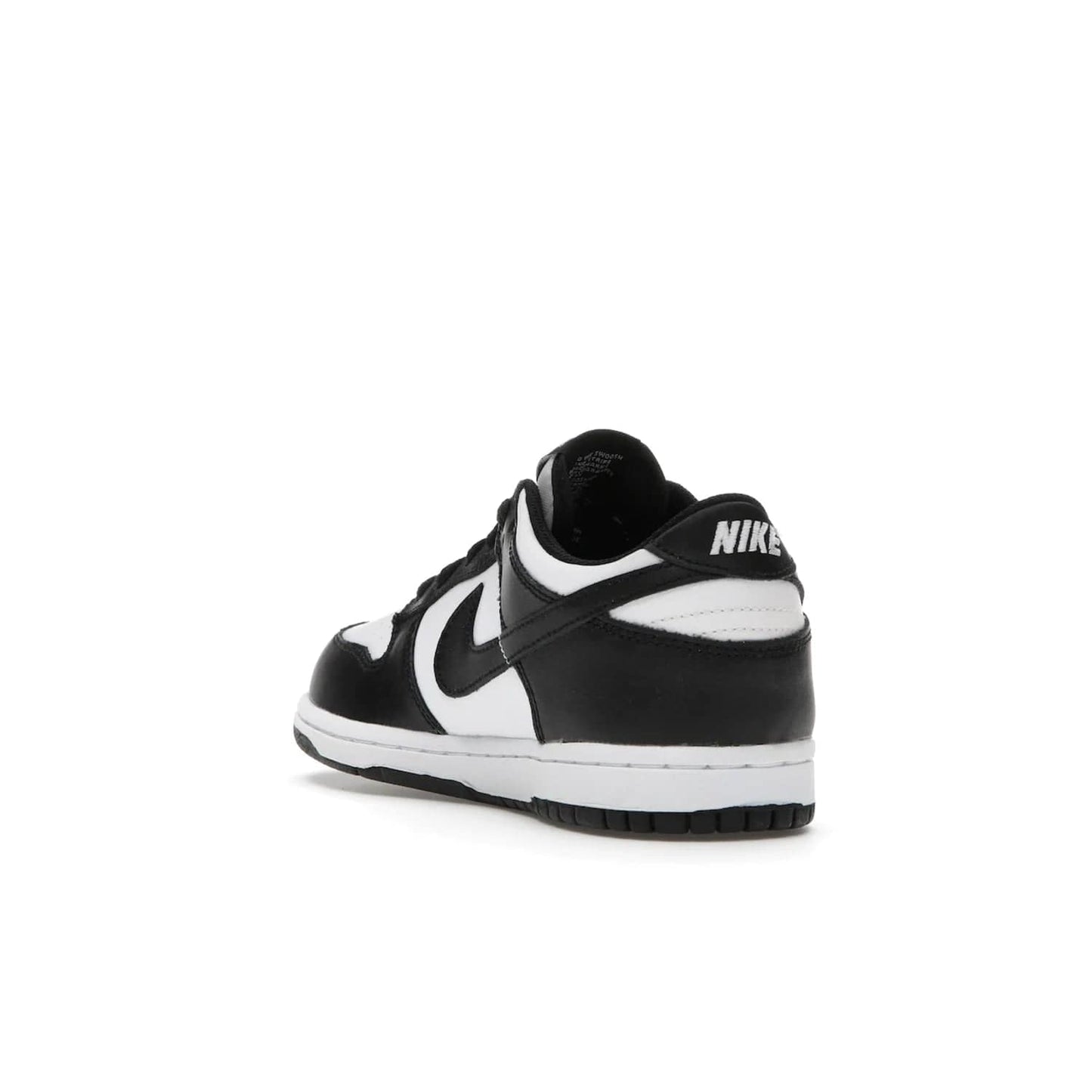 Nike Dunk Low Retro White Black Panda (2021) (PS) - Image 25 - Only at www.BallersClubKickz.com - Retro basketball style with modern updates: Nike Dunk Low PS White/Black. Find the classic sneaker with all-white leather upper, black overlays, black Swoosh branding an more. Originally released in March 2021.