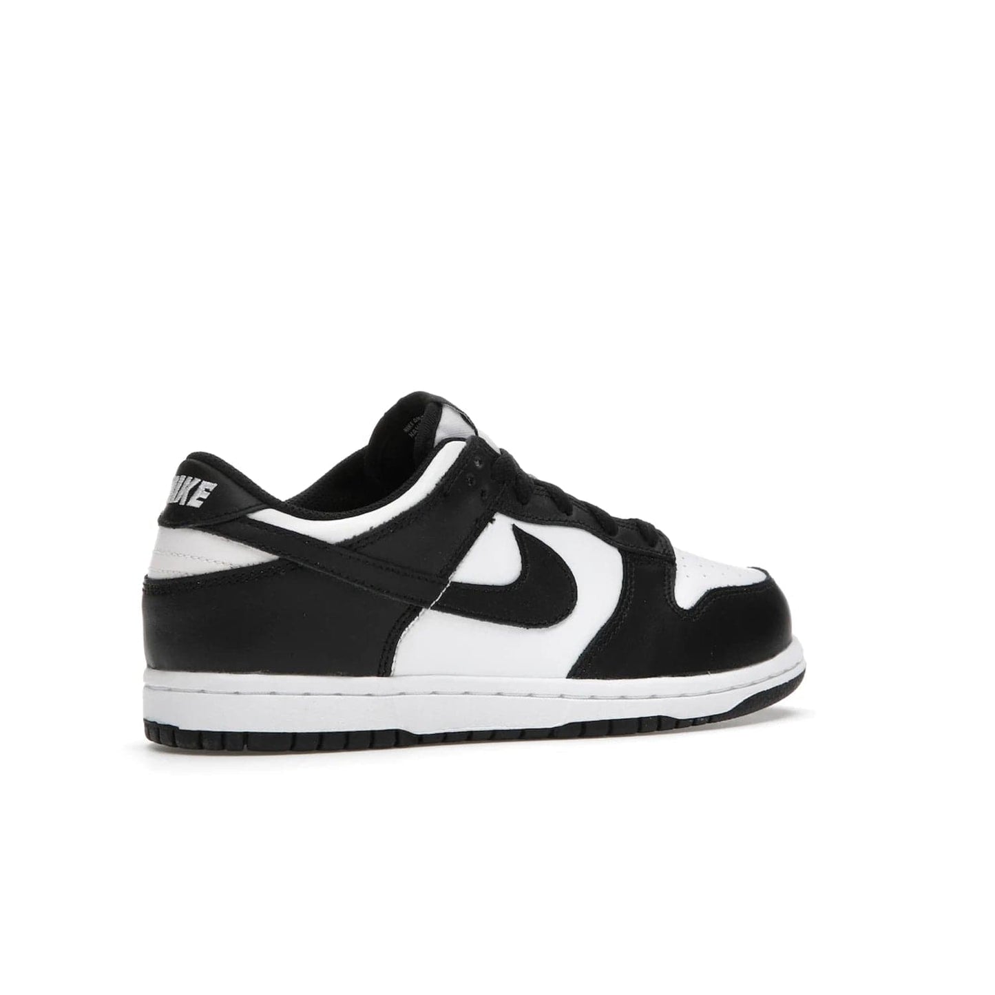 Nike Dunk Low Retro White Black Panda (2021) (PS) - Image 34 - Only at www.BallersClubKickz.com - Retro basketball style with modern updates: Nike Dunk Low PS White/Black. Find the classic sneaker with all-white leather upper, black overlays, black Swoosh branding an more. Originally released in March 2021.