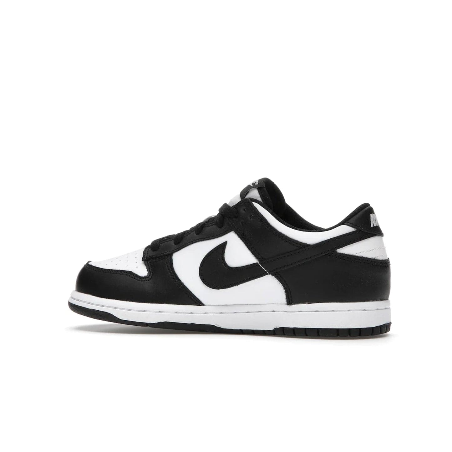 Nike Dunk Low Retro White Black Panda (2021) (PS) - Image 21 - Only at www.BallersClubKickz.com - Retro basketball style with modern updates: Nike Dunk Low PS White/Black. Find the classic sneaker with all-white leather upper, black overlays, black Swoosh branding an more. Originally released in March 2021.
