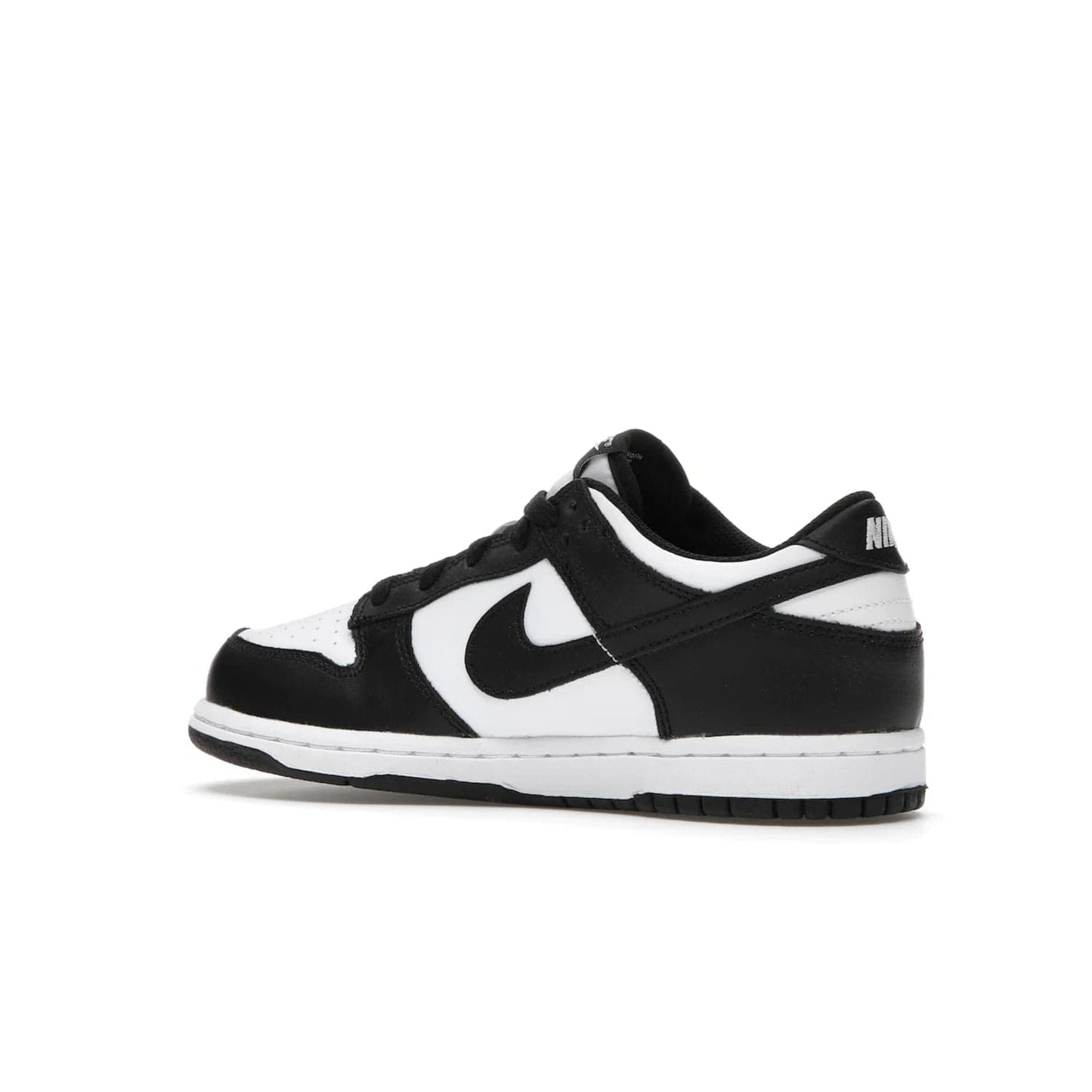 Nike Dunk Low Retro White Black Panda (2021) (PS) - Image 22 - Only at www.BallersClubKickz.com - Retro basketball style with modern updates: Nike Dunk Low PS White/Black. Find the classic sneaker with all-white leather upper, black overlays, black Swoosh branding an more. Originally released in March 2021.