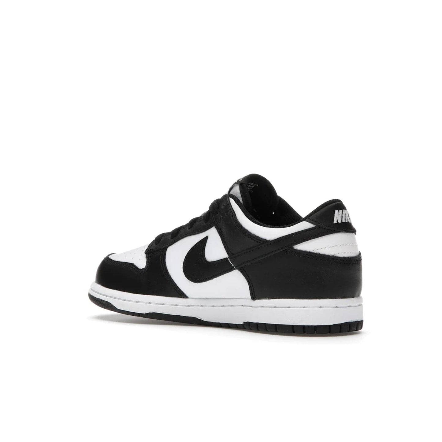 Nike Dunk Low Retro White Black Panda (2021) (PS) - Image 23 - Only at www.BallersClubKickz.com - Retro basketball style with modern updates: Nike Dunk Low PS White/Black. Find the classic sneaker with all-white leather upper, black overlays, black Swoosh branding an more. Originally released in March 2021.