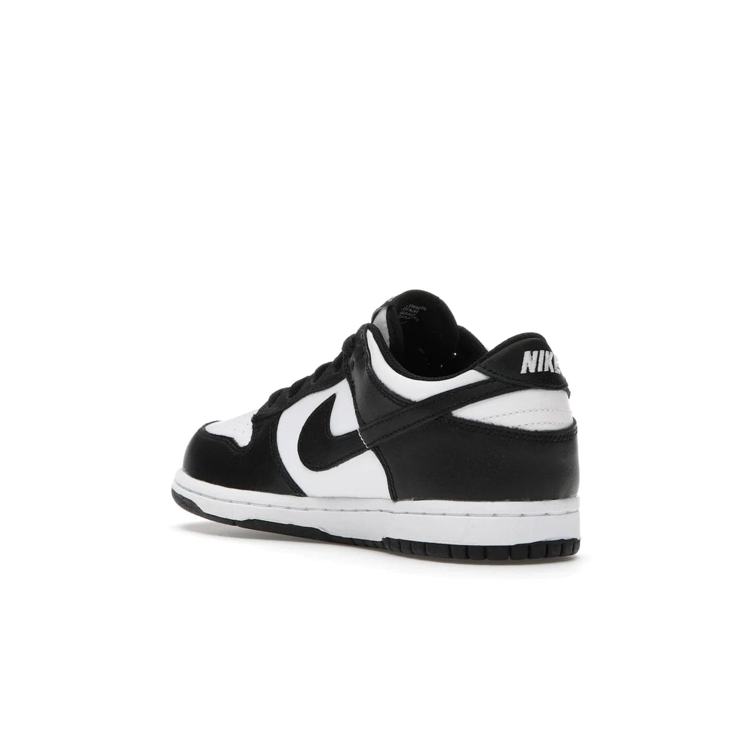 Nike Dunk Low Retro White Black Panda (2021) (PS) - Image 24 - Only at www.BallersClubKickz.com - Retro basketball style with modern updates: Nike Dunk Low PS White/Black. Find the classic sneaker with all-white leather upper, black overlays, black Swoosh branding an more. Originally released in March 2021.