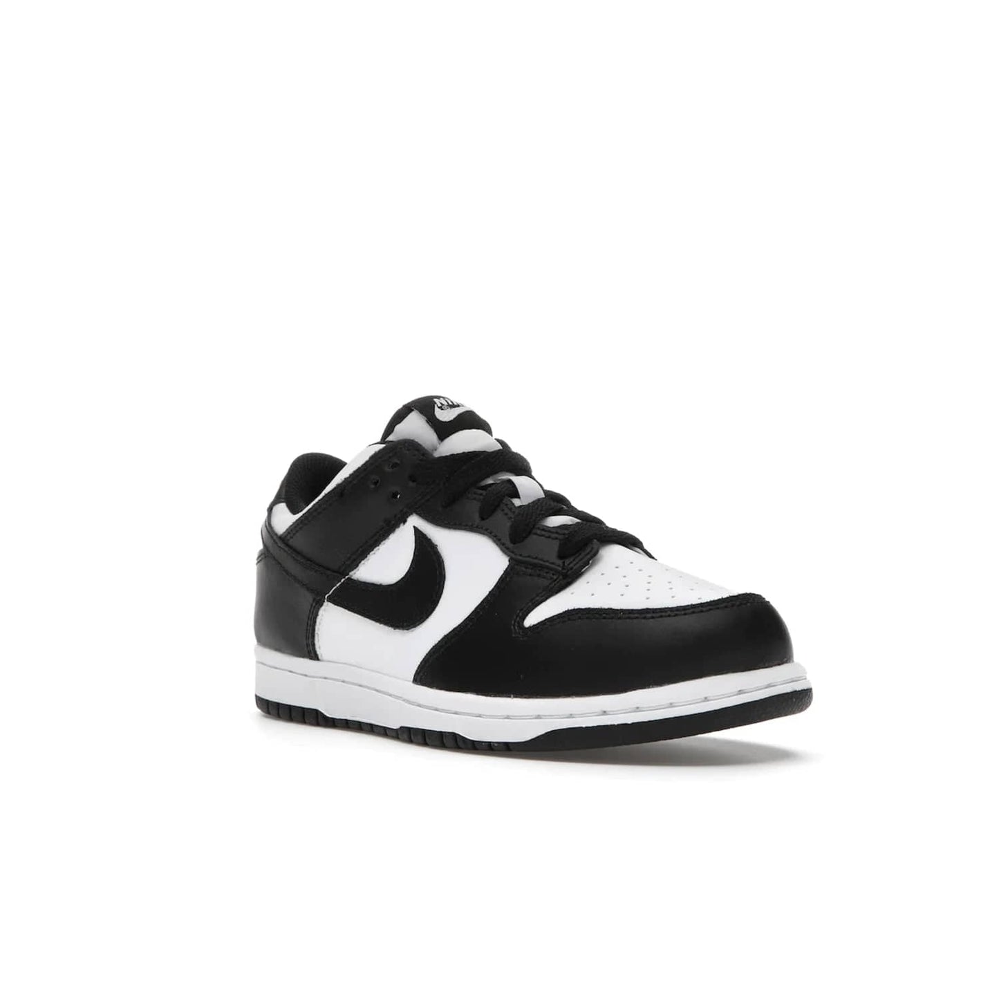 Nike Dunk Low Retro White Black Panda (2021) (PS) - Image 6 - Only at www.BallersClubKickz.com - Retro basketball style with modern updates: Nike Dunk Low PS White/Black. Find the classic sneaker with all-white leather upper, black overlays, black Swoosh branding an more. Originally released in March 2021.