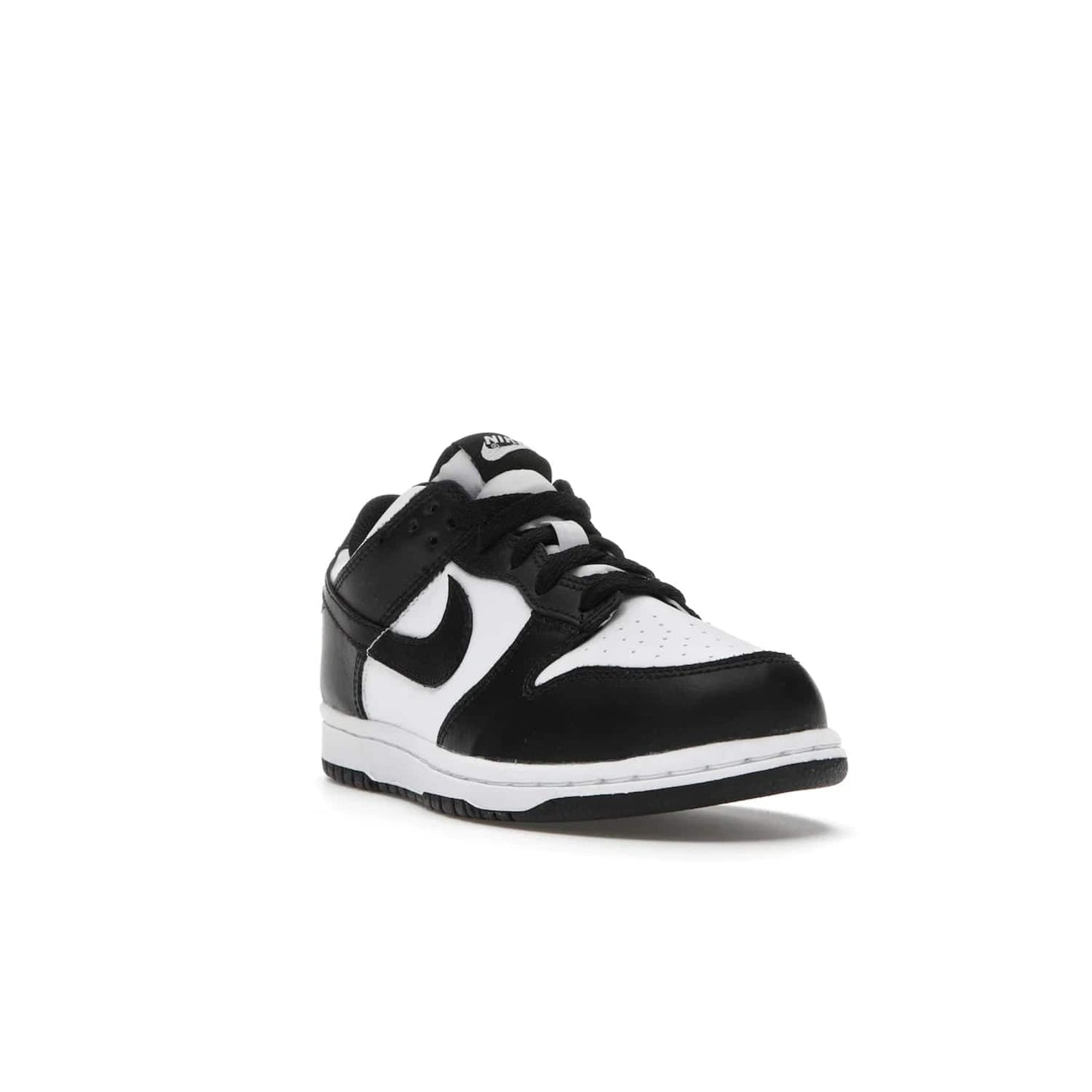 Nike Dunk Low Retro White Black Panda (2021) (PS) - Image 7 - Only at www.BallersClubKickz.com - Retro basketball style with modern updates: Nike Dunk Low PS White/Black. Find the classic sneaker with all-white leather upper, black overlays, black Swoosh branding an more. Originally released in March 2021.
