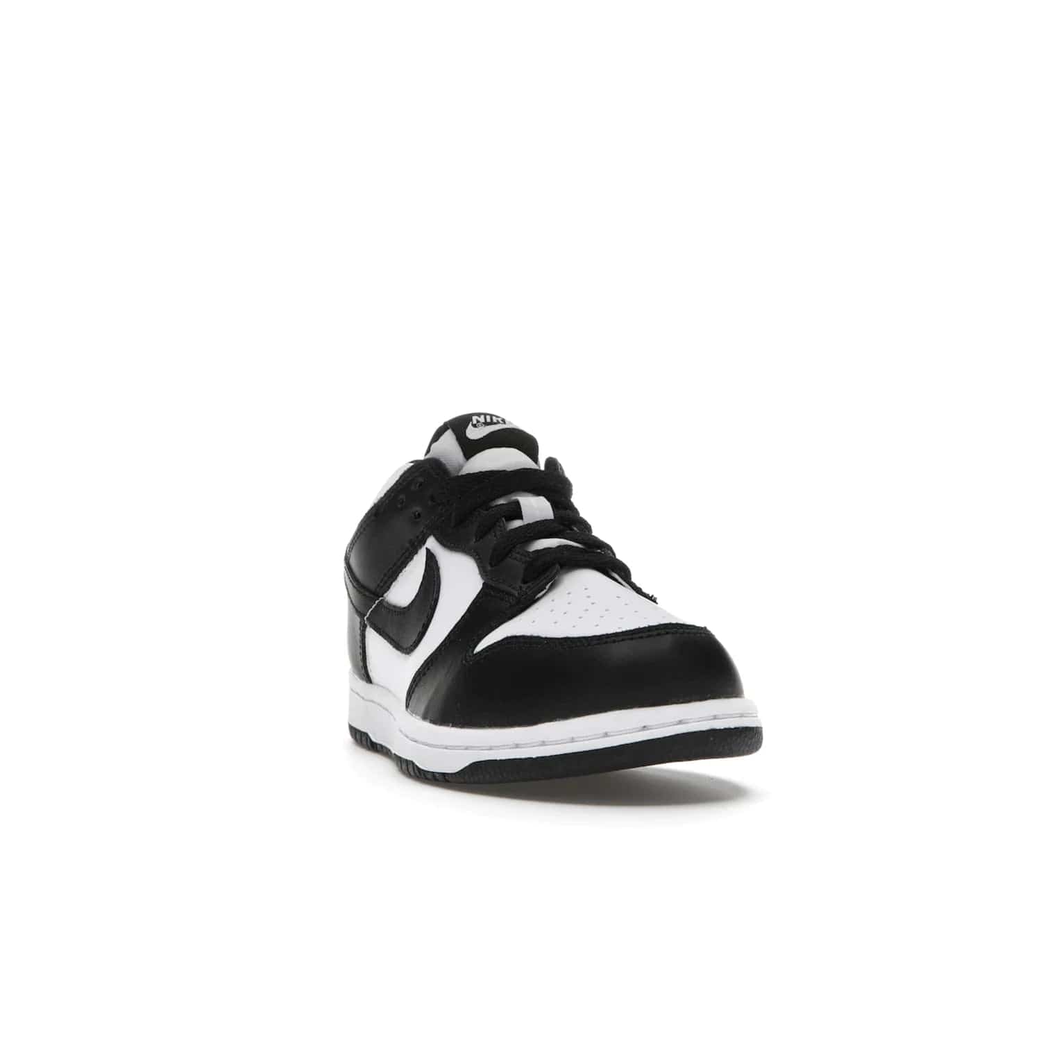 Nike Dunk Low Retro White Black Panda (2021) (PS) - Image 8 - Only at www.BallersClubKickz.com - Retro basketball style with modern updates: Nike Dunk Low PS White/Black. Find the classic sneaker with all-white leather upper, black overlays, black Swoosh branding an more. Originally released in March 2021.